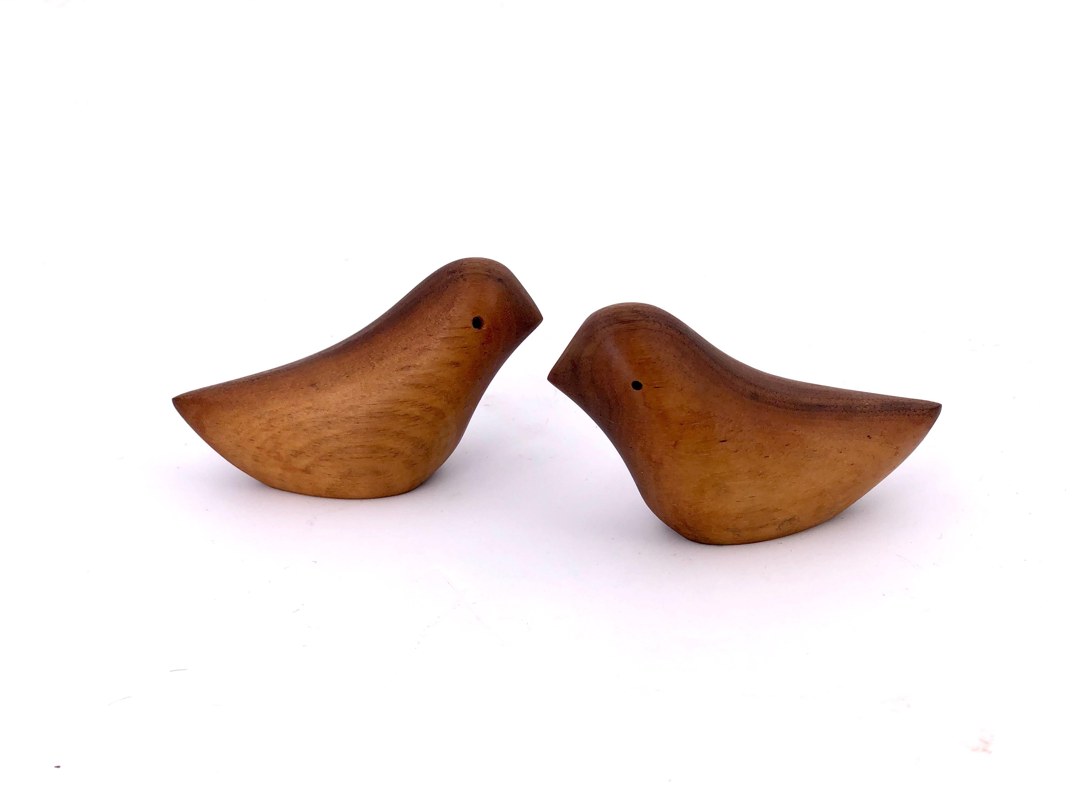 Beautiful solid walnut carved Mid-Century Modern, love birds salt and pepper shakers, circa 1960s.