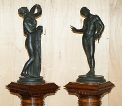PAIR OF SOMMER FOUNDRY NARCISSUS & VENUS CALLIPYGIAN BRONZE STATUES & PEDESTALSs