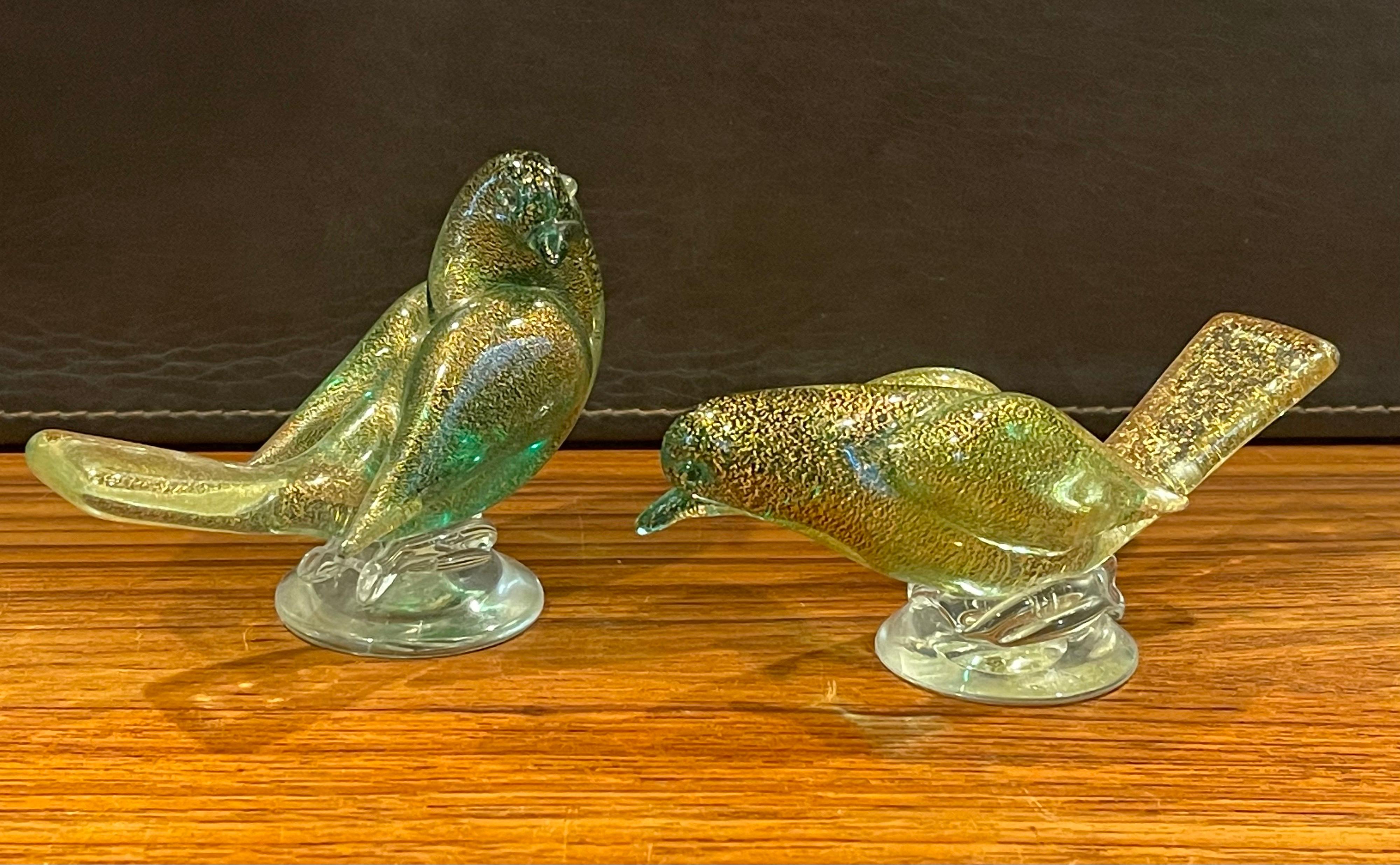 Nice pair of art glass song birds / sparrows by Murano glass studios, circa 1970s in a green / gold / clear sommerso style glass with gold speckles. The first bird measures 2.5