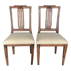 Pair of Sophisticated Early Carved French Walnut Side Chairs