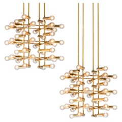 Pair of Sophisticated Large Swiss Chandeliers in Brass