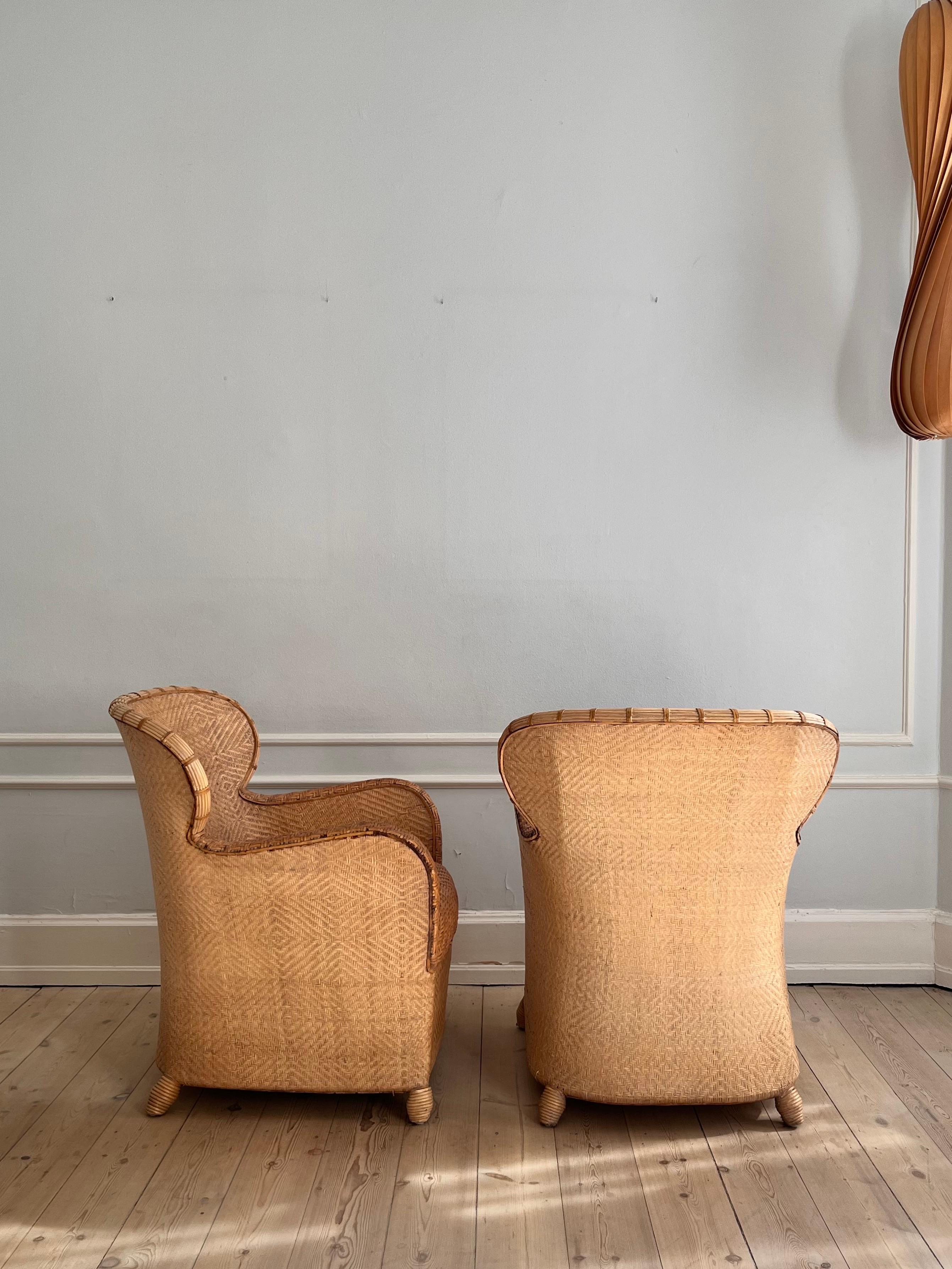 Danish Pair of Soren Lund Lounge Chairs / Arm chairs in Wicker / Cane and leather