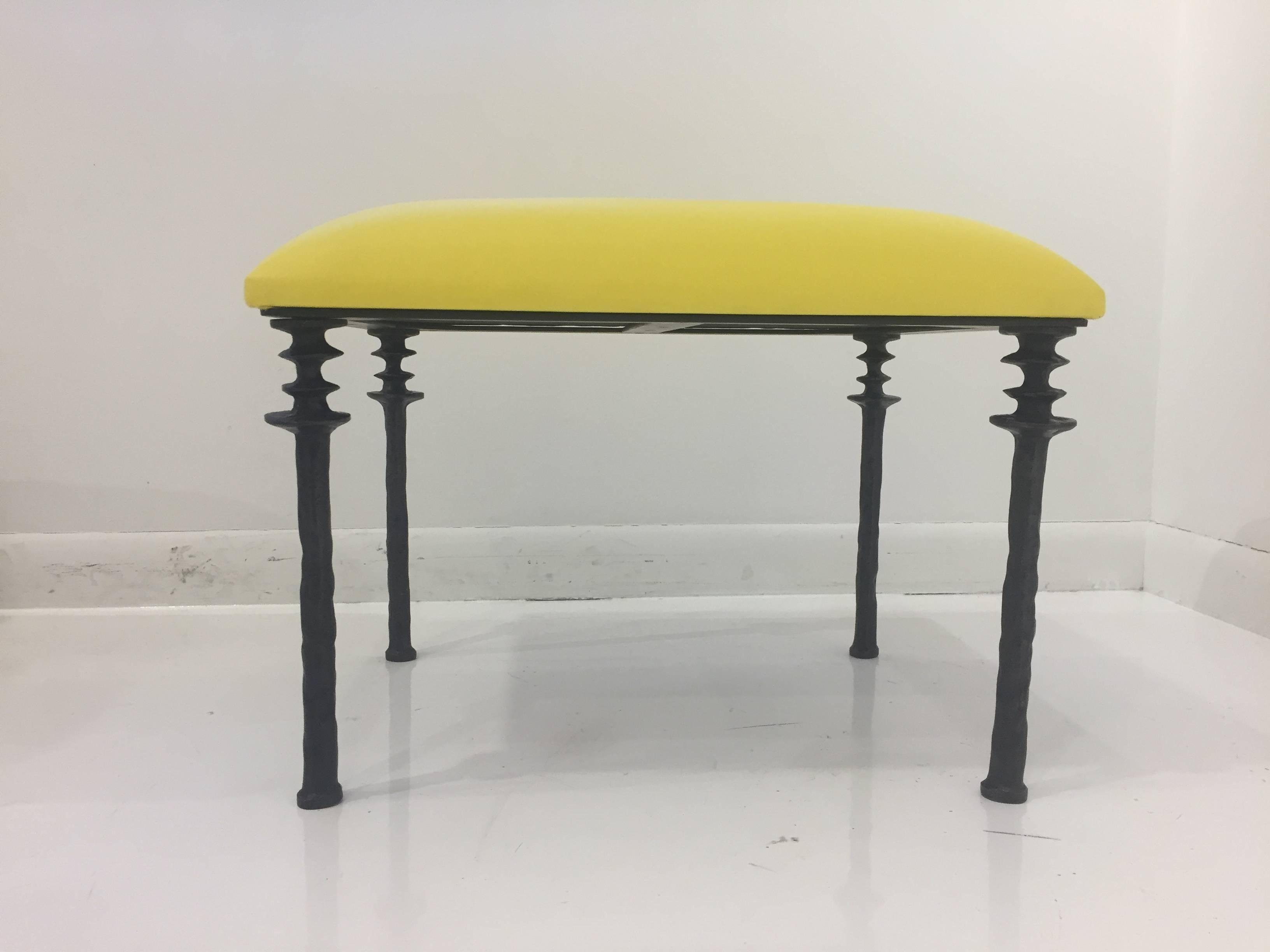 Two beautiful stools inspired by Diego Giacometti, these stools are ideal for
those who are looking for unique seating. Their cast bronze legs provide
a truly organic touch. The seat cushion has been upholstered in yellow leather. Stools are in