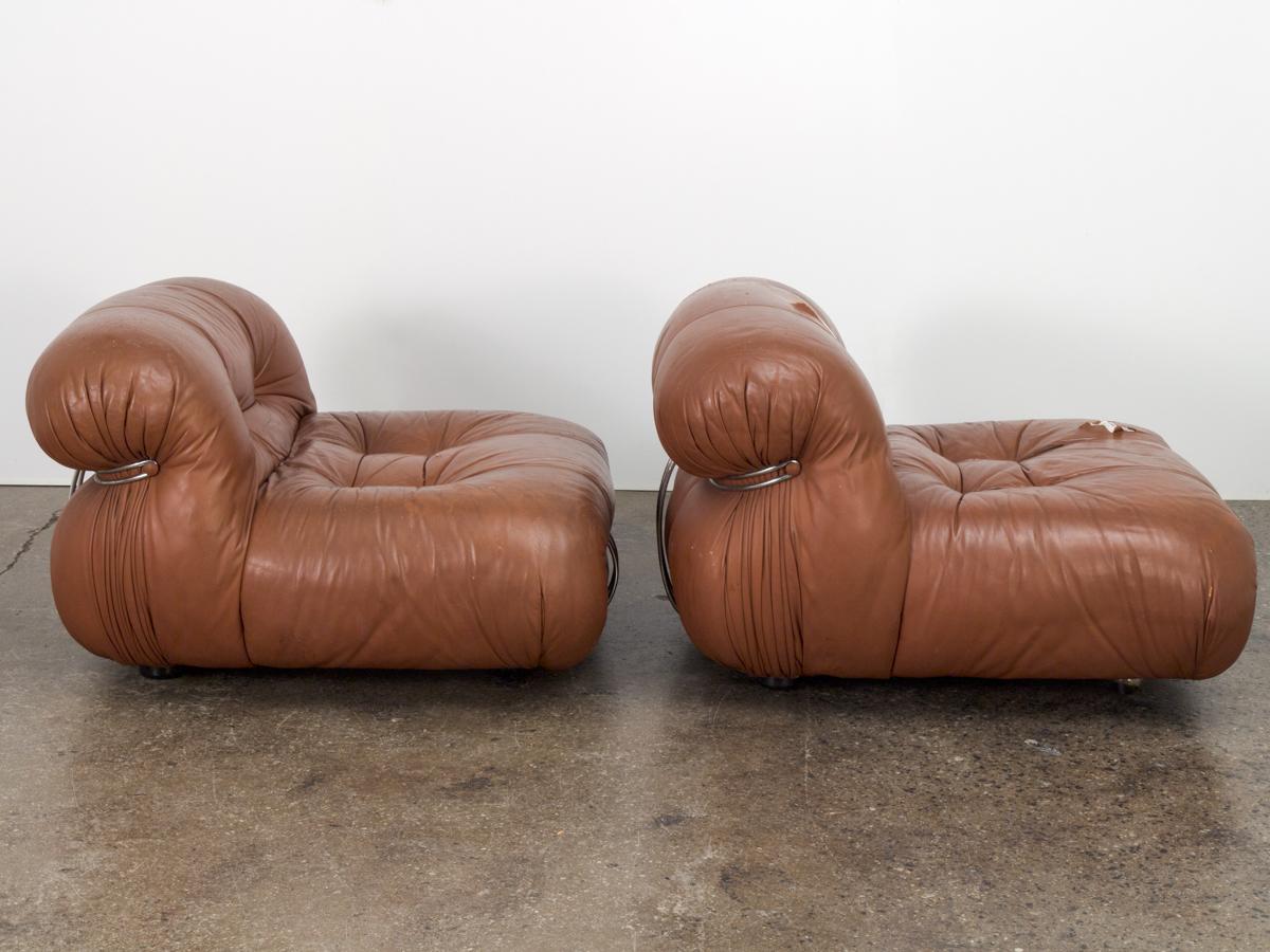 Pair of vintage Soriana lounge chairs designed by couple Tobia and Afra Scarpa for Cassina. All sprawlers welcome to this subversive, Italian Postmodern lounge chair. Sculpted cushions are sturdy and plush, with their original gathered pleats