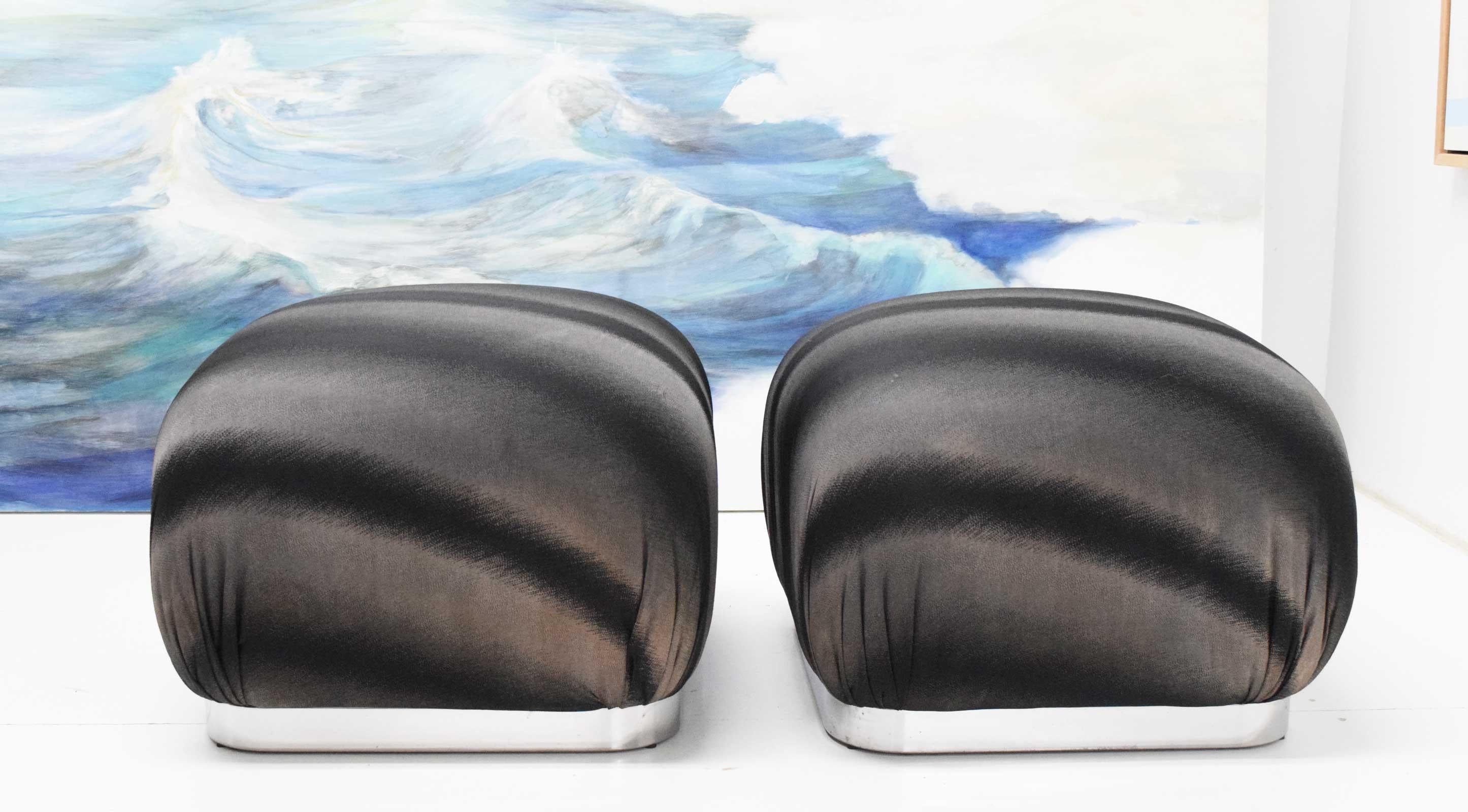 Pair of Souffle poufs by Weiman. Have chrome trim on base.