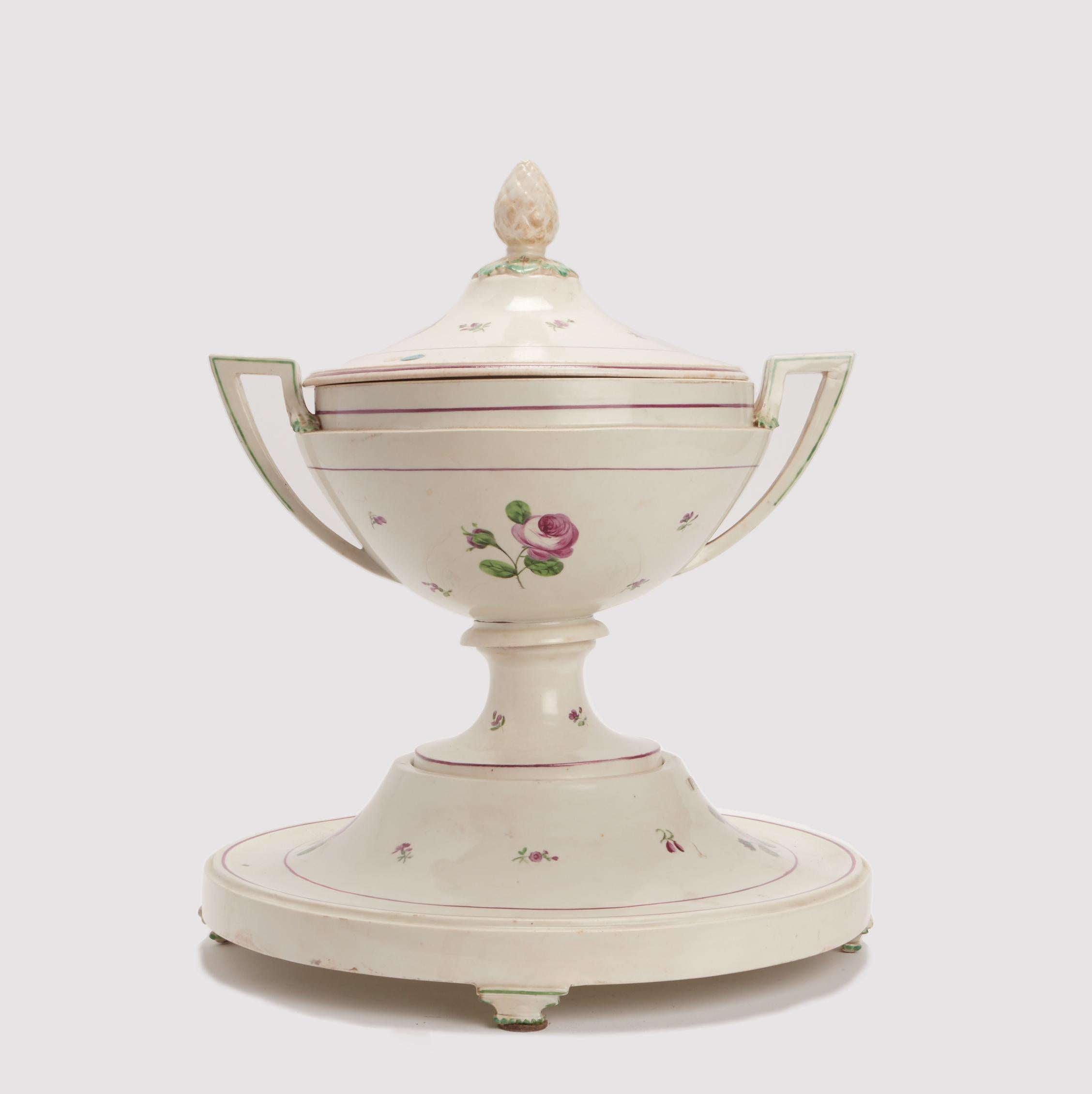 Pair of soup terrine with bases and angled handles, old Vienna Porcelain manufactory, decorated with roses motives over a white field. Underlined with light purple and green lines. Geometrically shaped feet, top of the cover decorated with leaves