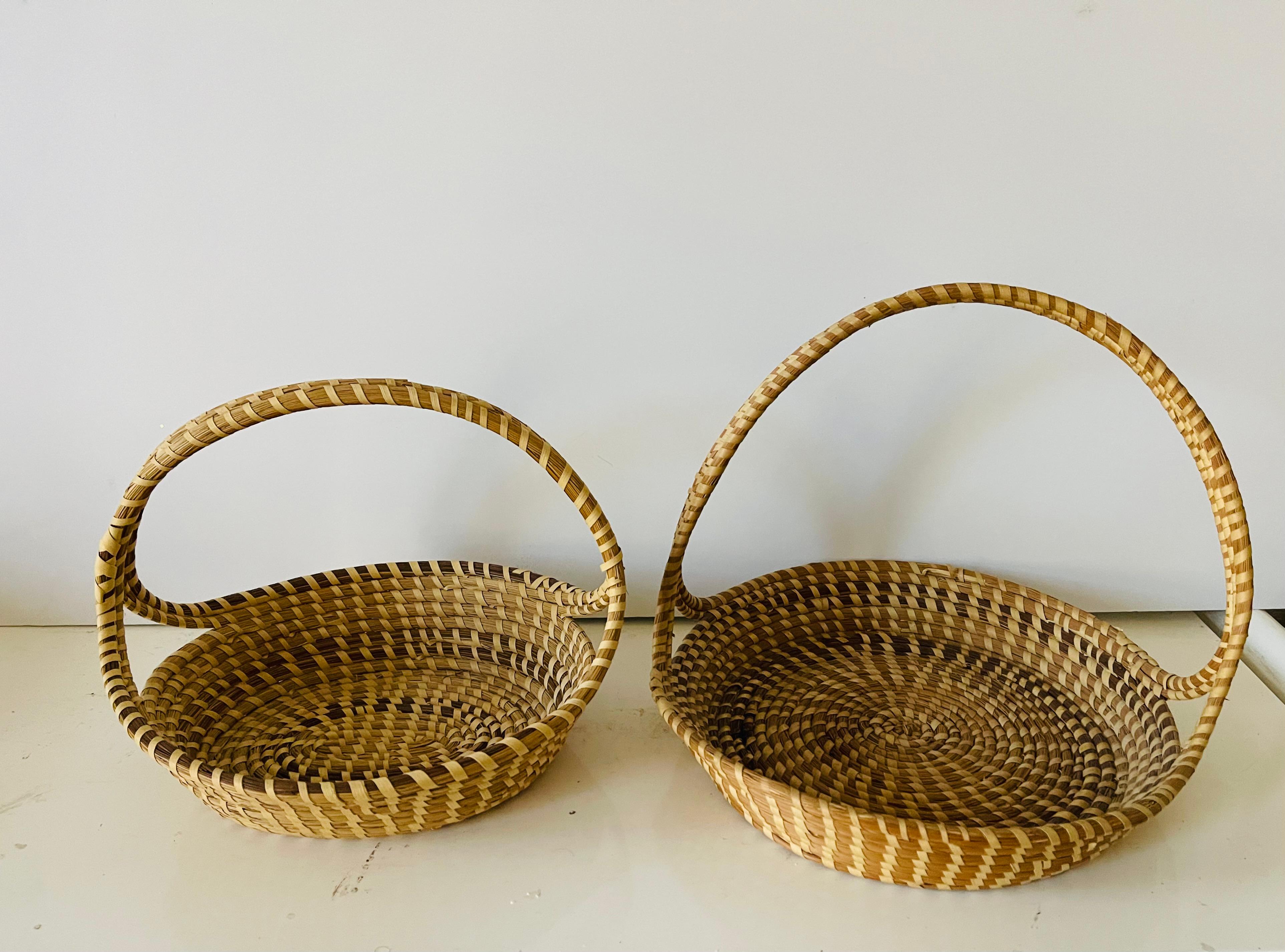 Pair of American vintage handmade South Carolina straw baskets  Rare collectible.