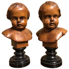Pair of South German Carved Wood Busts of Putti