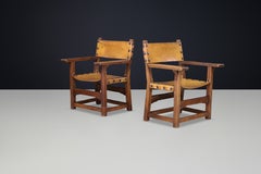 Pair of Spanish 1950s Solid Beechwood Armchairs with Patinated Cognac Leather