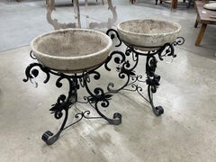 Pair of Spanish Art Dec Cast Stone Planters And Wrought Iron Stands