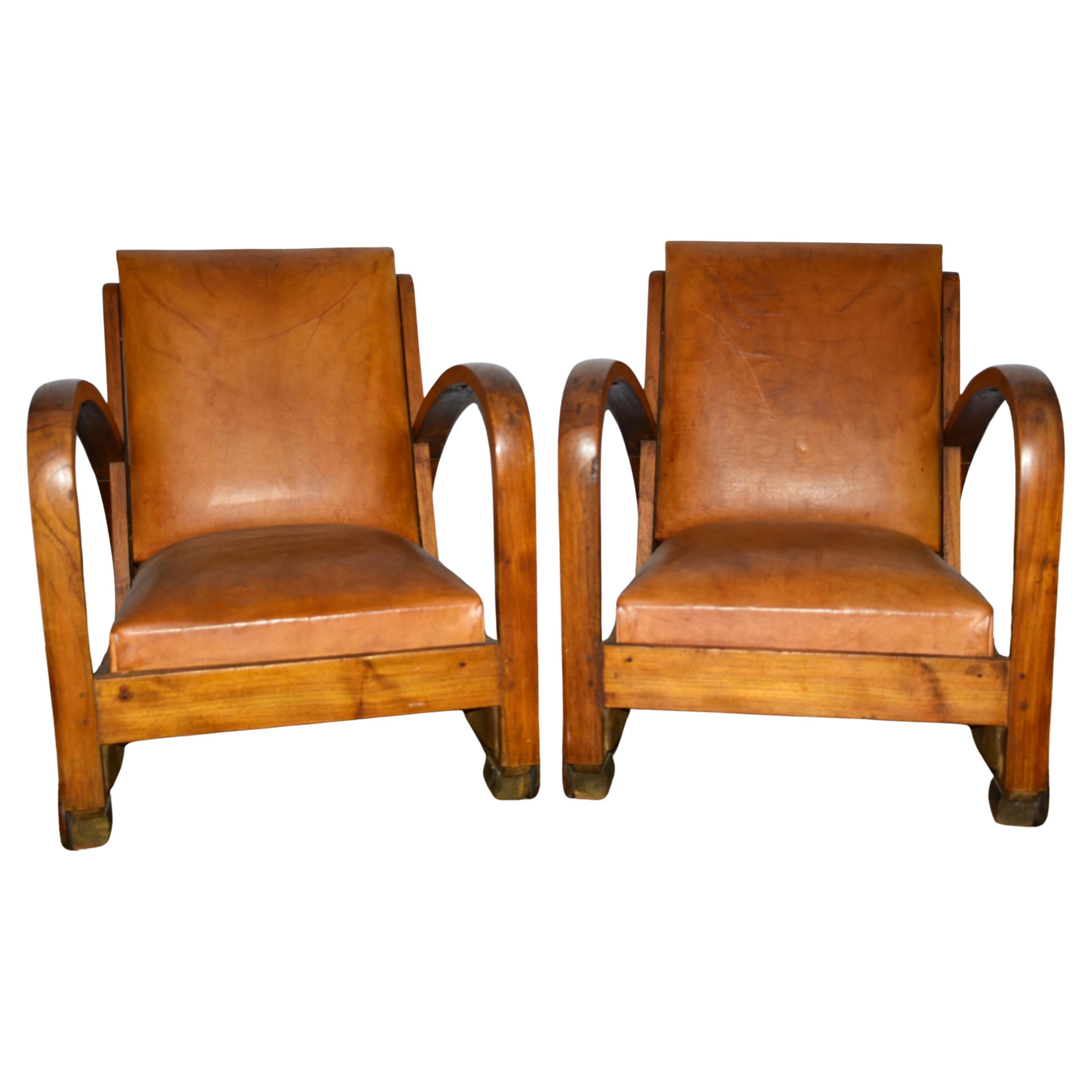 Pair of Spanish Art Deco wood and leather chairs For Sale