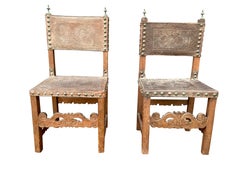 Pair of Spanish Baroque Embossed Leather Side Chairs