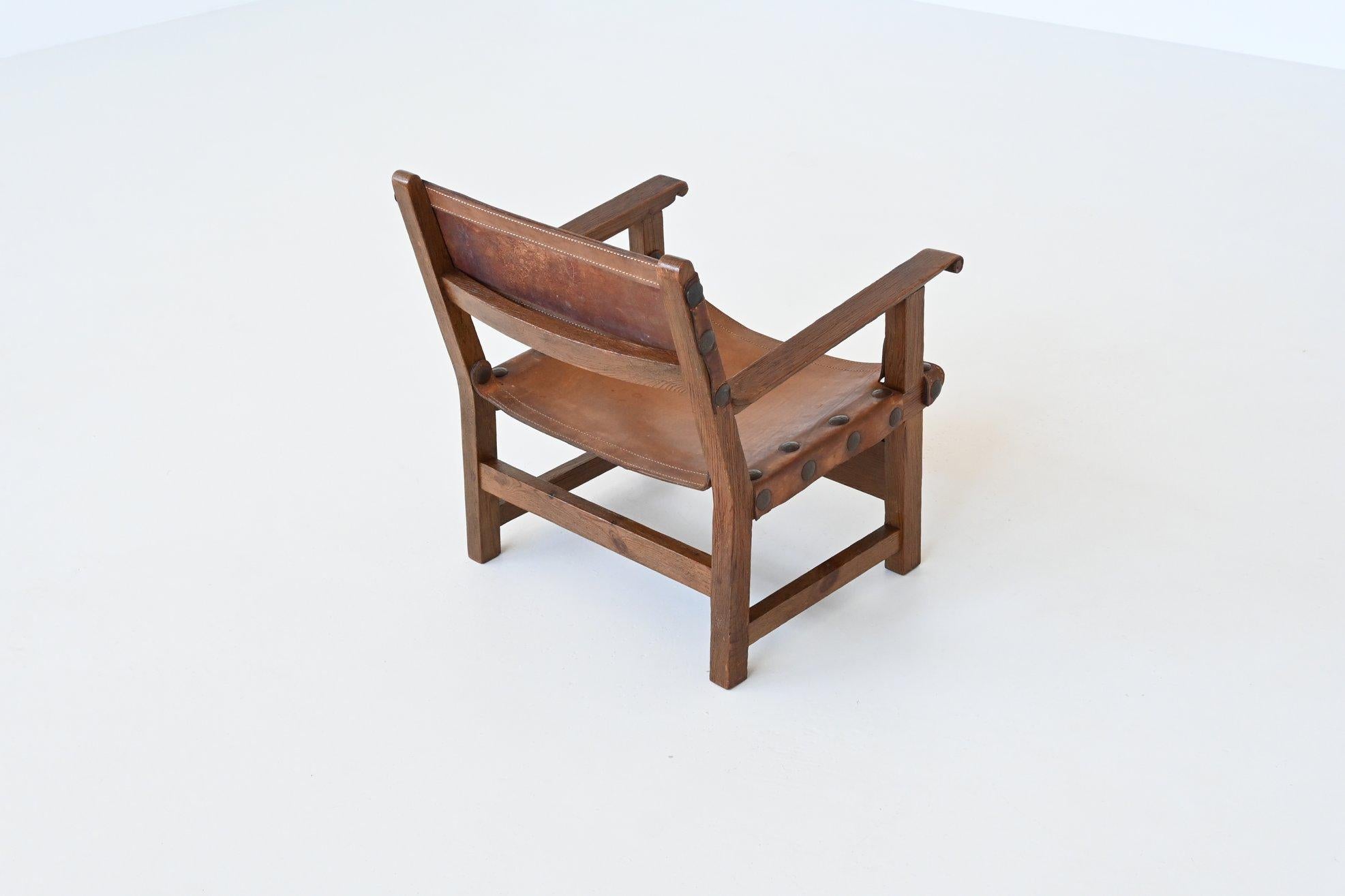 Pair of Spanish brutalist lounge chairs oak and saddle leather Spain 1960 7
