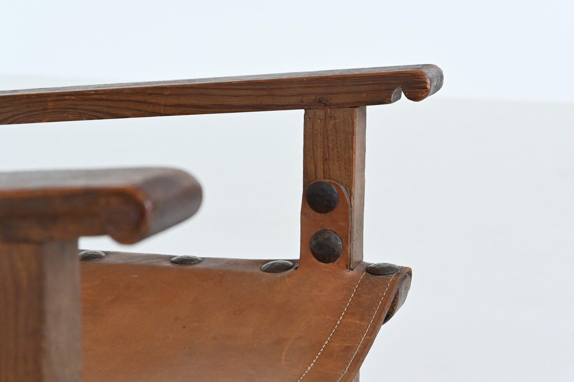 Pair of Spanish brutalist lounge chairs oak and saddle leather Spain 1960 8