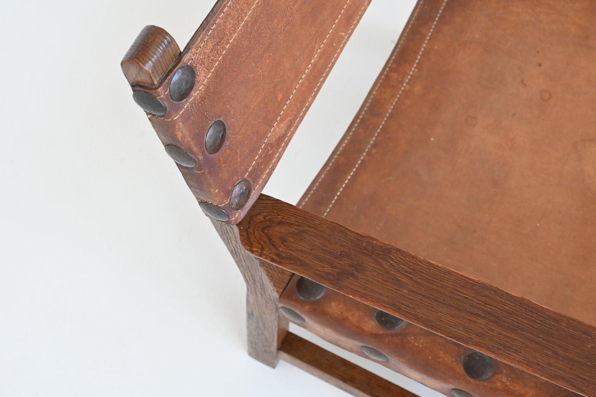 Pair of Spanish brutalist lounge chairs oak and saddle leather Spain 1960 11
