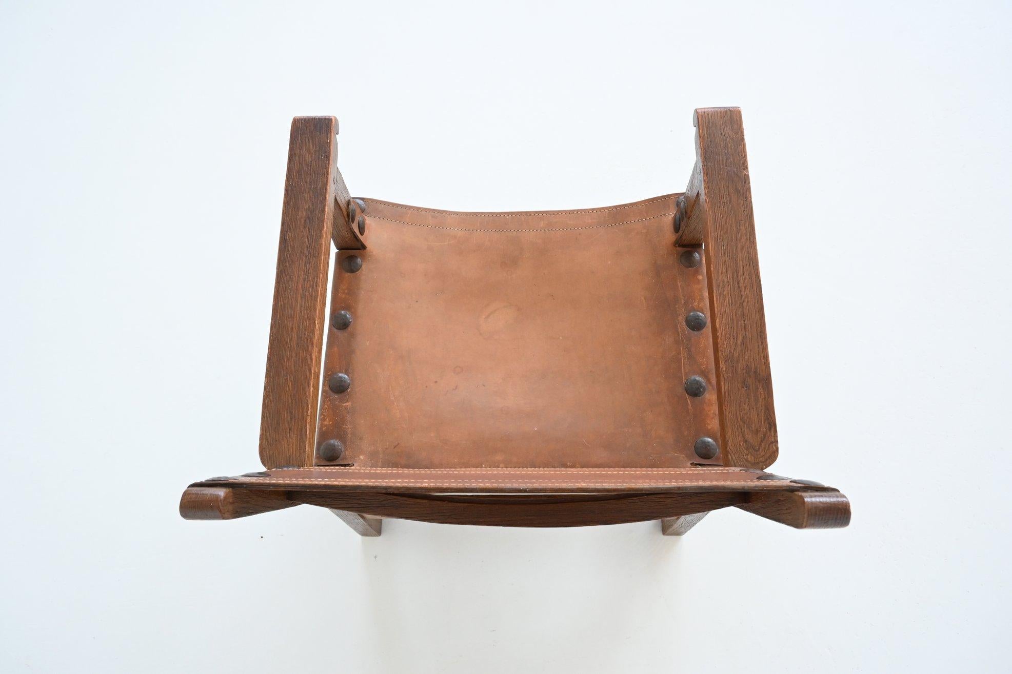 Pair of Spanish brutalist lounge chairs oak and saddle leather Spain 1960 12