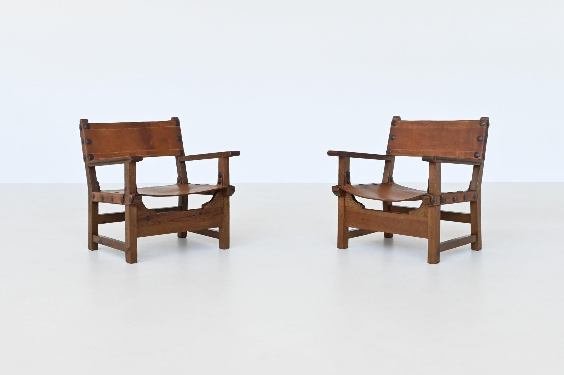 Brutalist Pair of Spanish brutalist lounge chairs oak and saddle leather Spain 1960