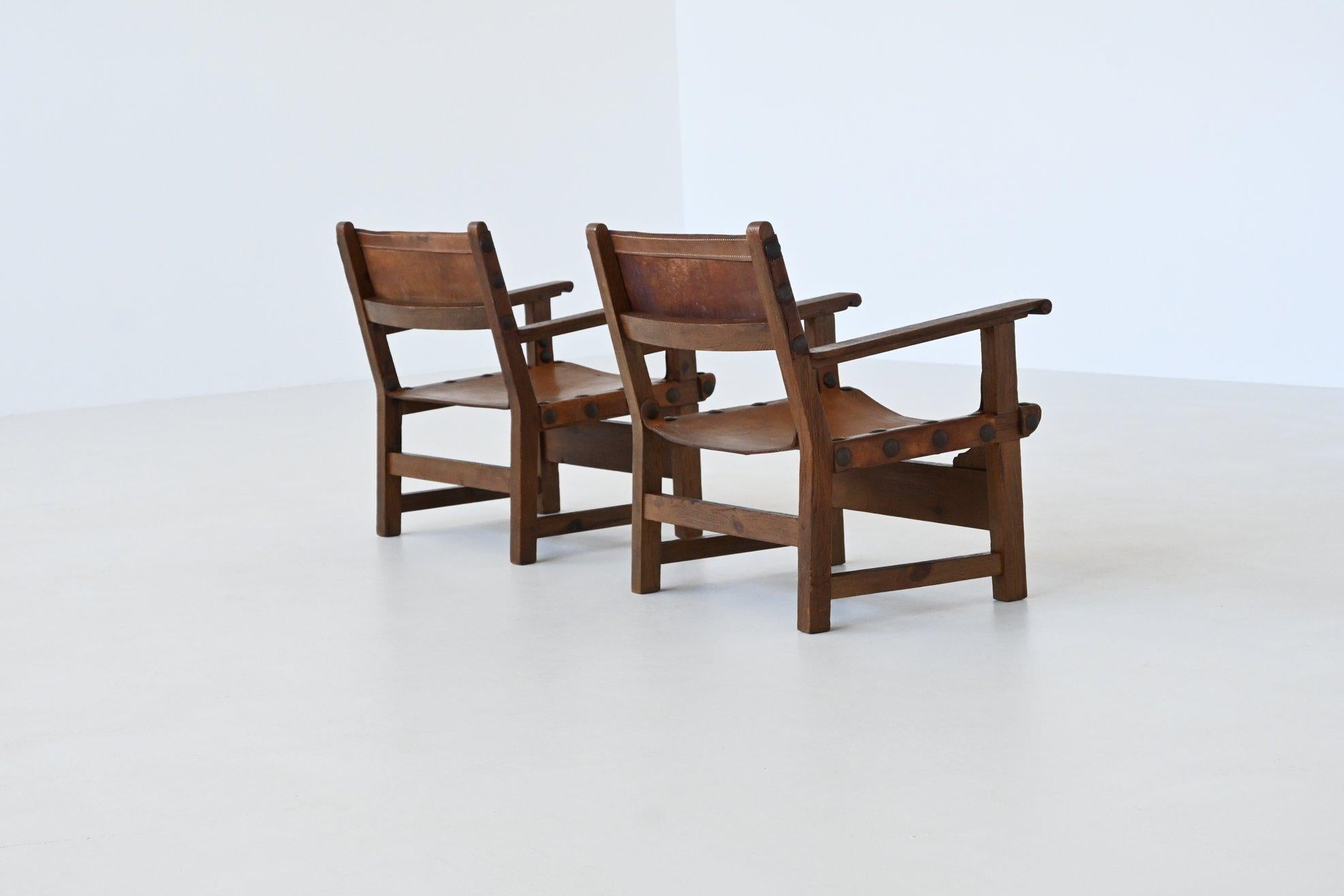 Pair of Spanish brutalist lounge chairs oak and saddle leather Spain 1960 3