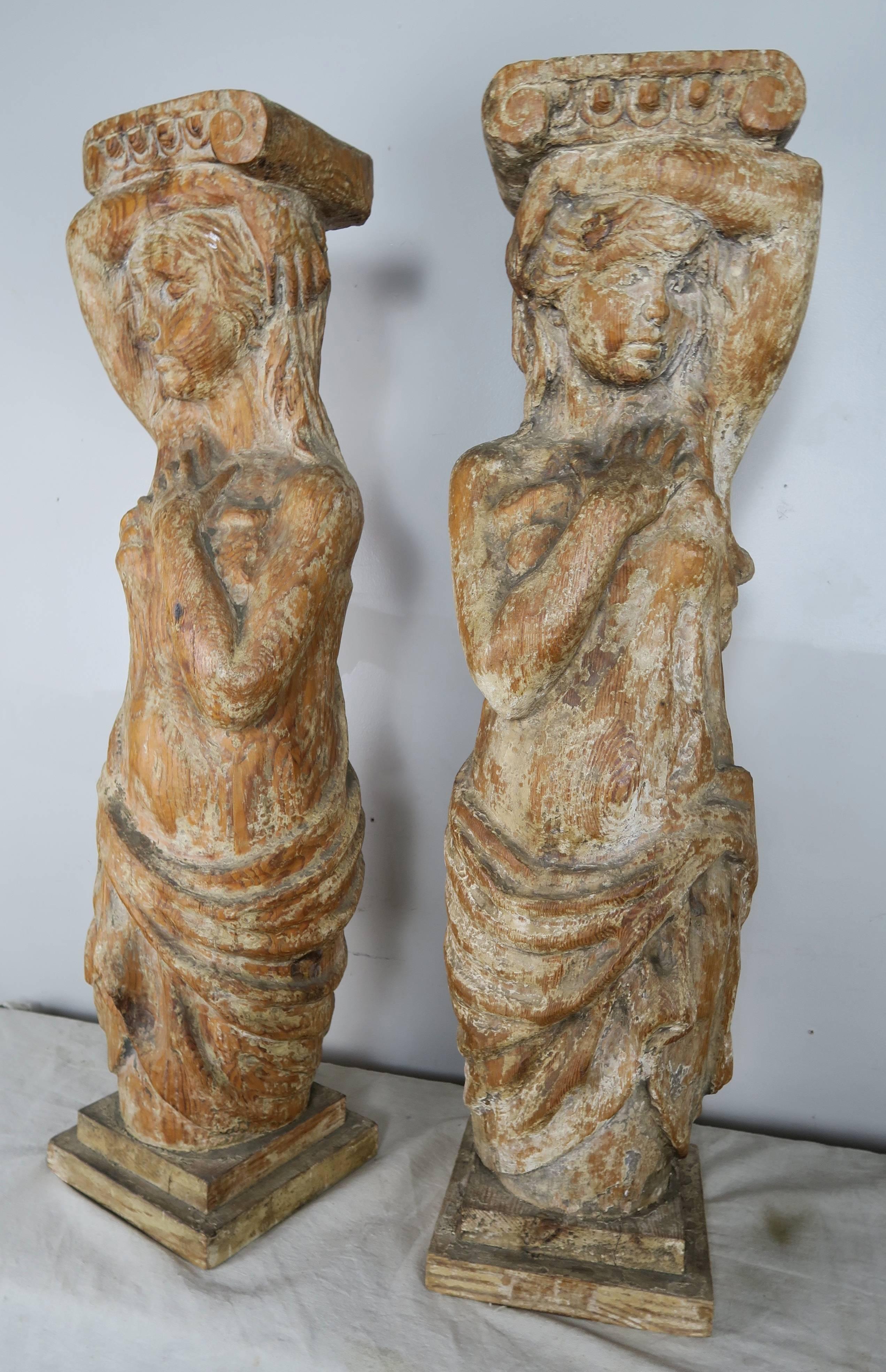 Pair of Spanish Carved Wood Figural Pedestals 1