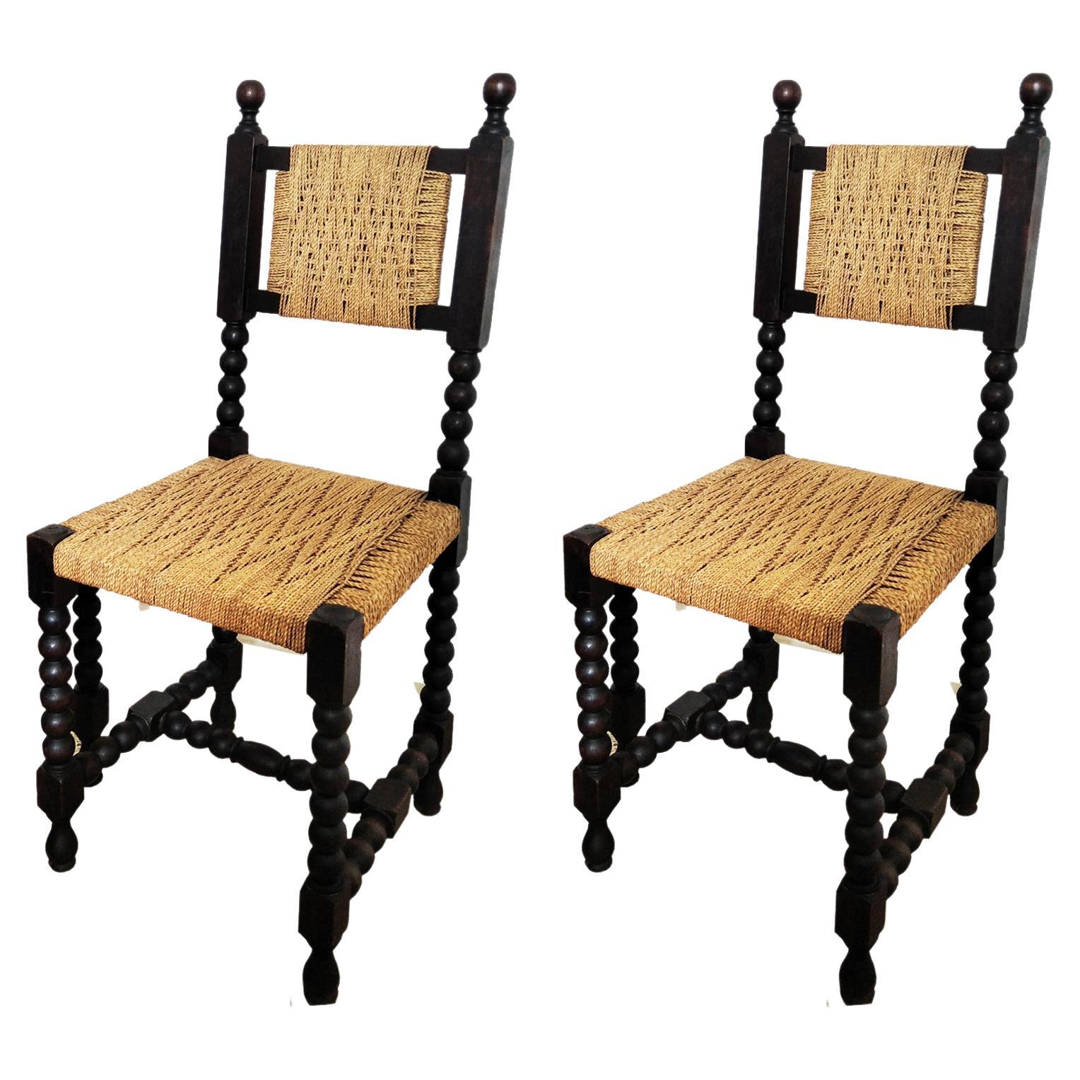 They are beautiful, like a work of art
  In perfect use conditions
Wherever you put them, it is impossible for them not to stand out

19th Century or early.
Pair of Spanish chairs in turned oak wood and interwoven rope.

 Two pieces of simple