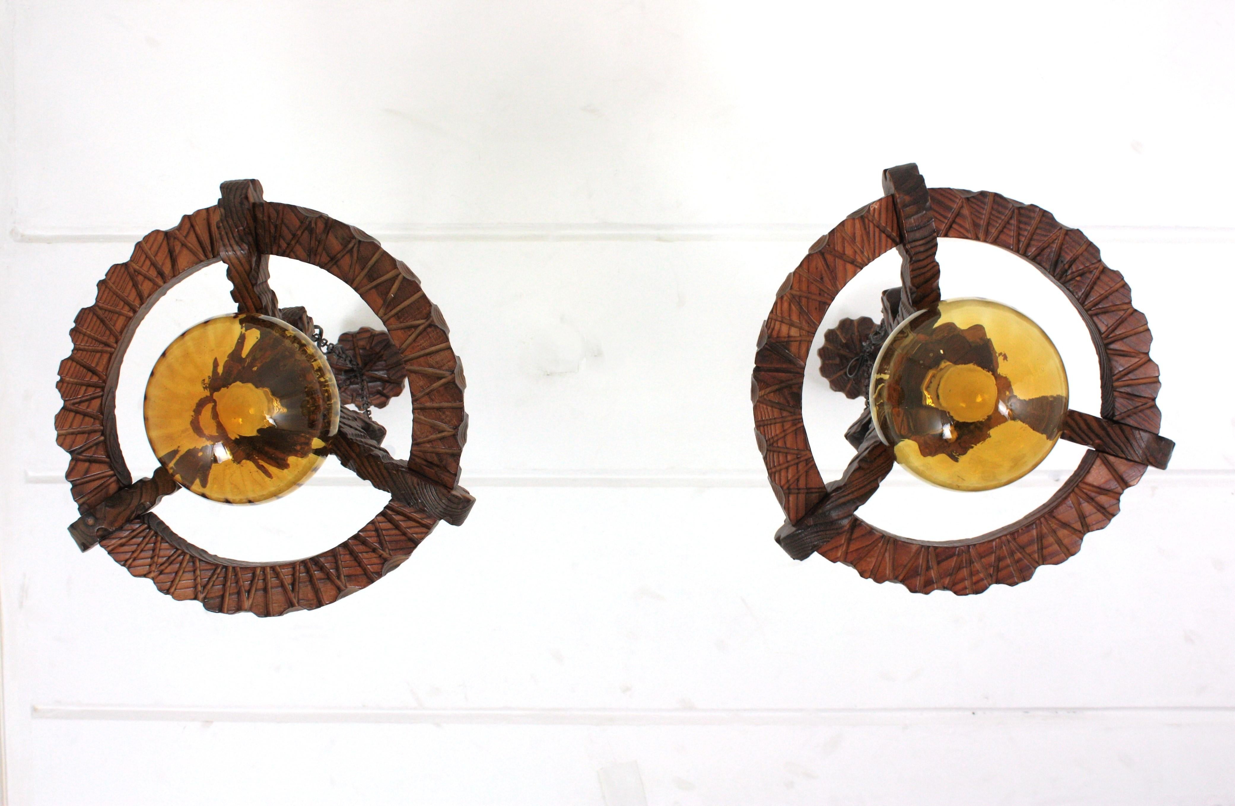 Pair of Spanish Colonial Pendants / Light Fixtures in Carved Wood & Amber Glass For Sale 14