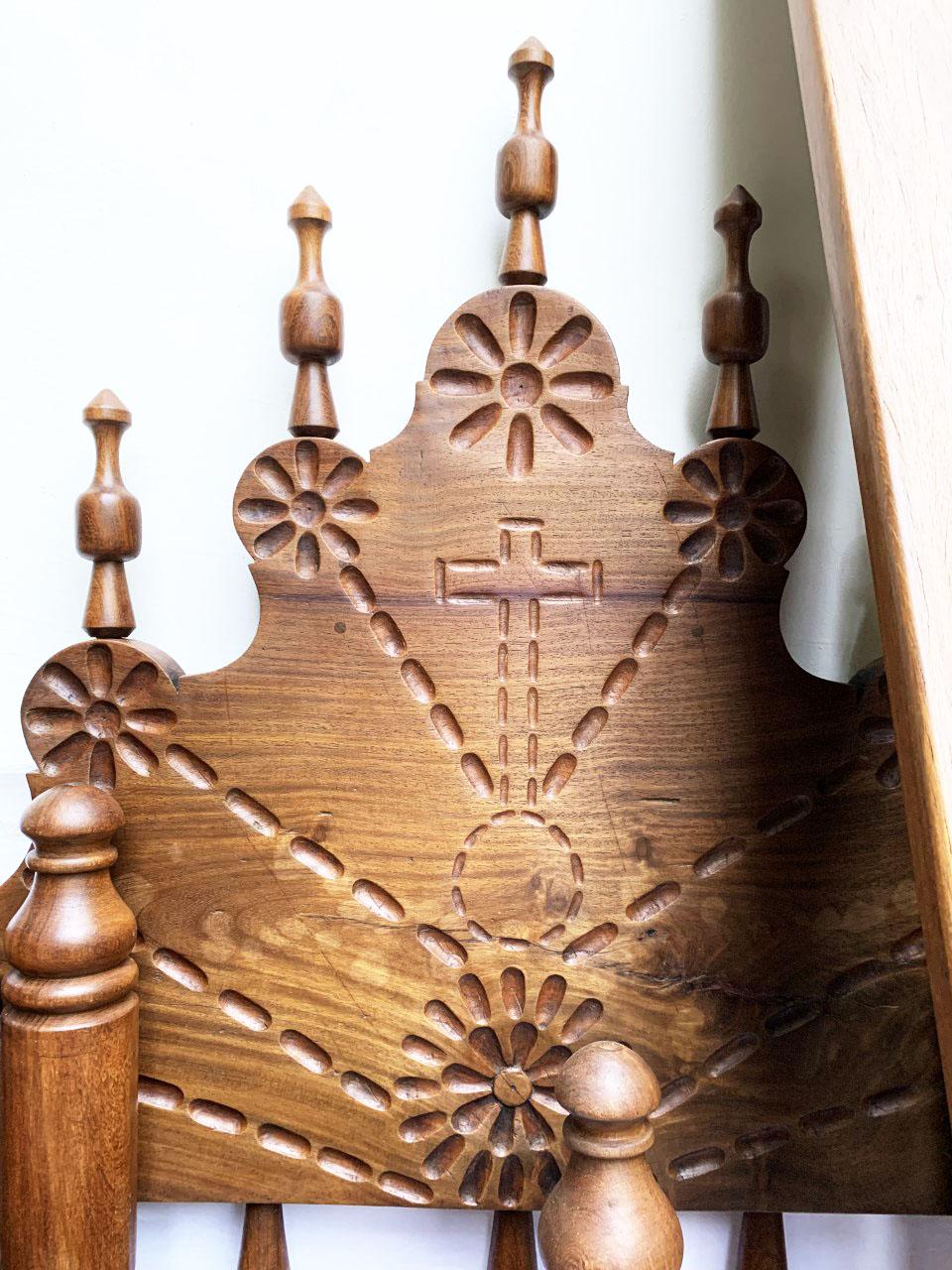 This stunning pair of Spanish Colonial Revival beds, crafted in the 1930s, captures the essence of timeless craftsmanship and historical charm. These heavy, solid pieces are constructed from high-quality wood, showcasing the intricate, hand-carved