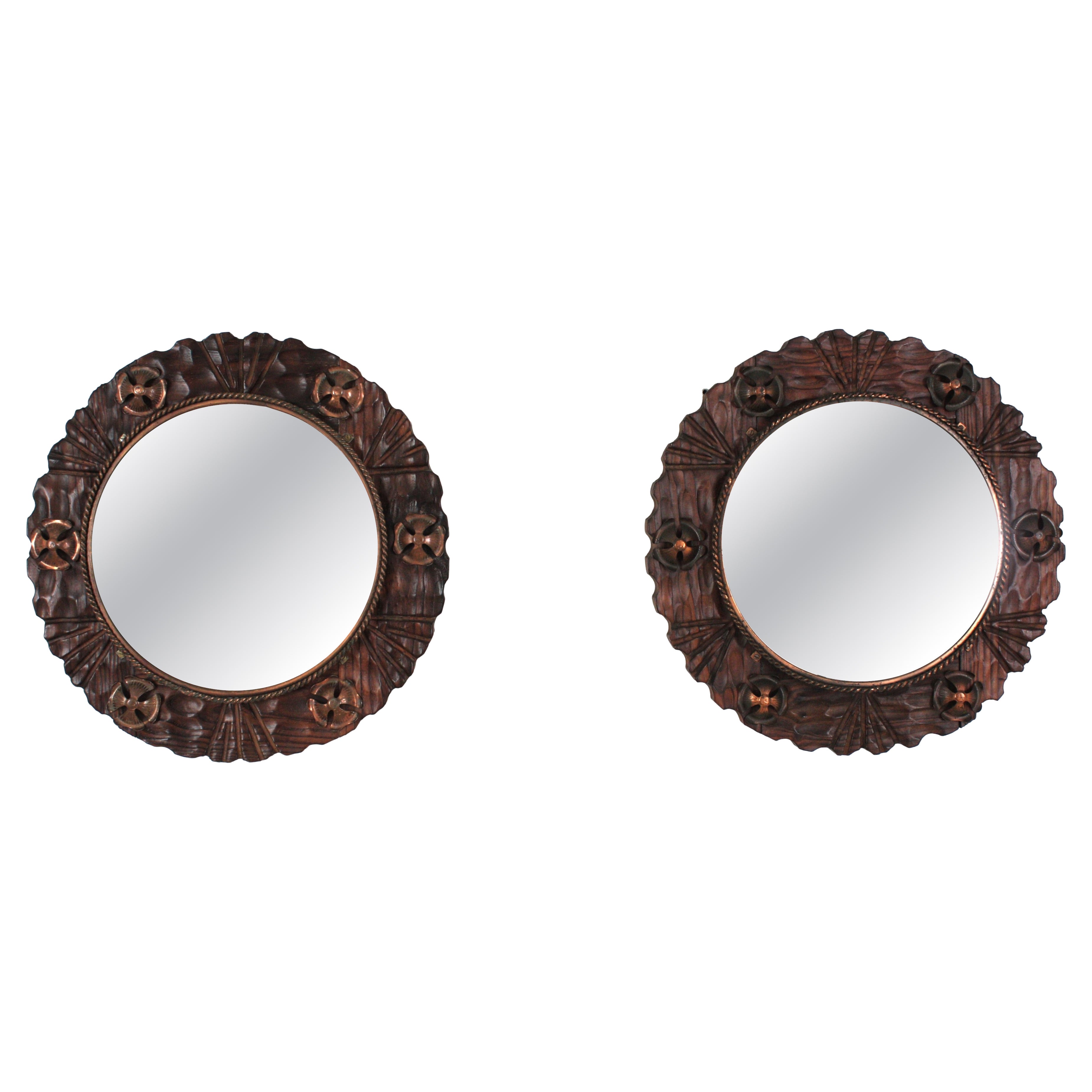 Pair of Spanish Colonial Round Wall Mirrors in Carved Wood and Copper Flowers
