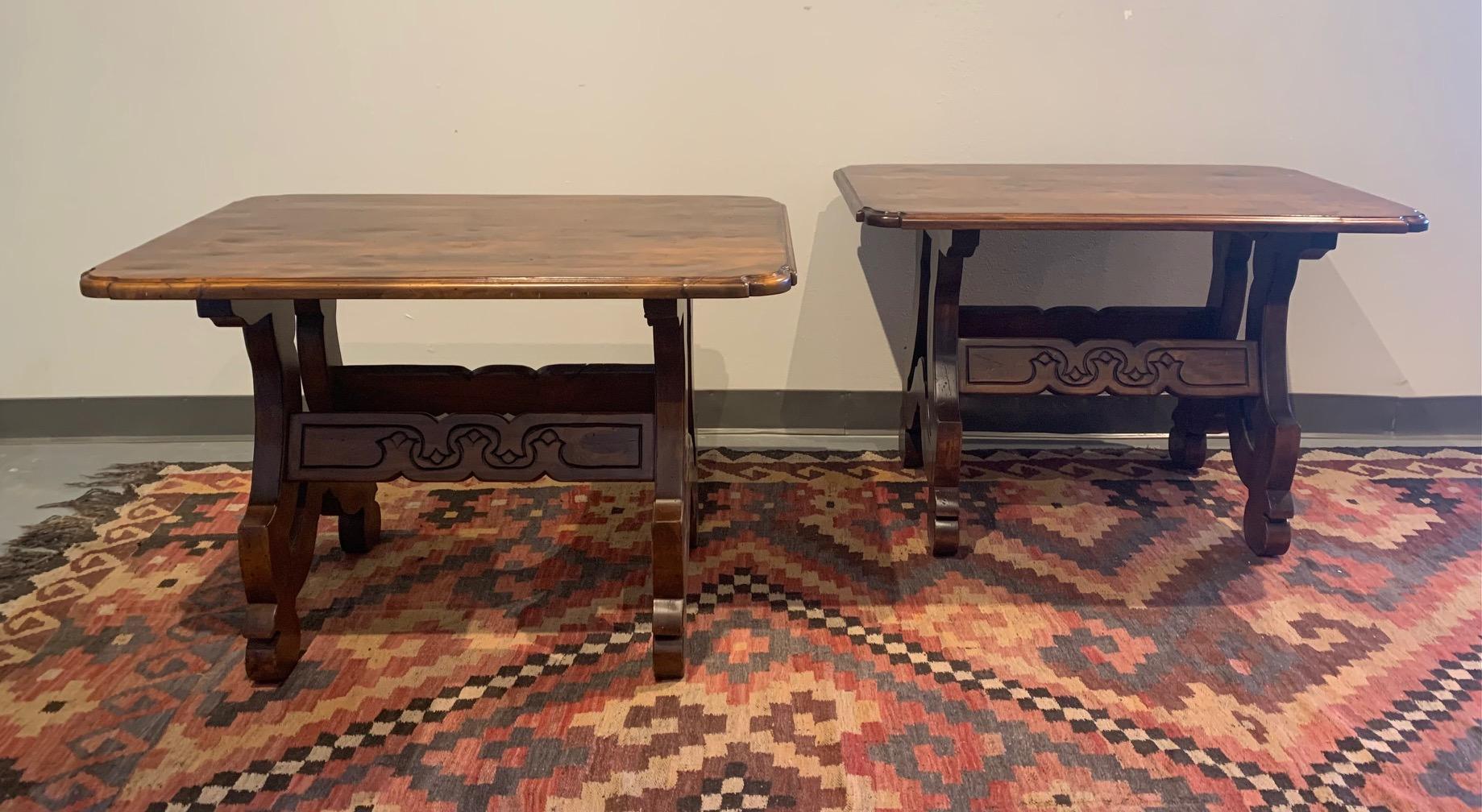 This pair of Spanish Craftsmen end tables are large in scale and beautifully hand distressed and hand carved. Knotty Alder with a custom finish.
These are showroom floor models with some scratches on the table tops but otherwise in excellent
