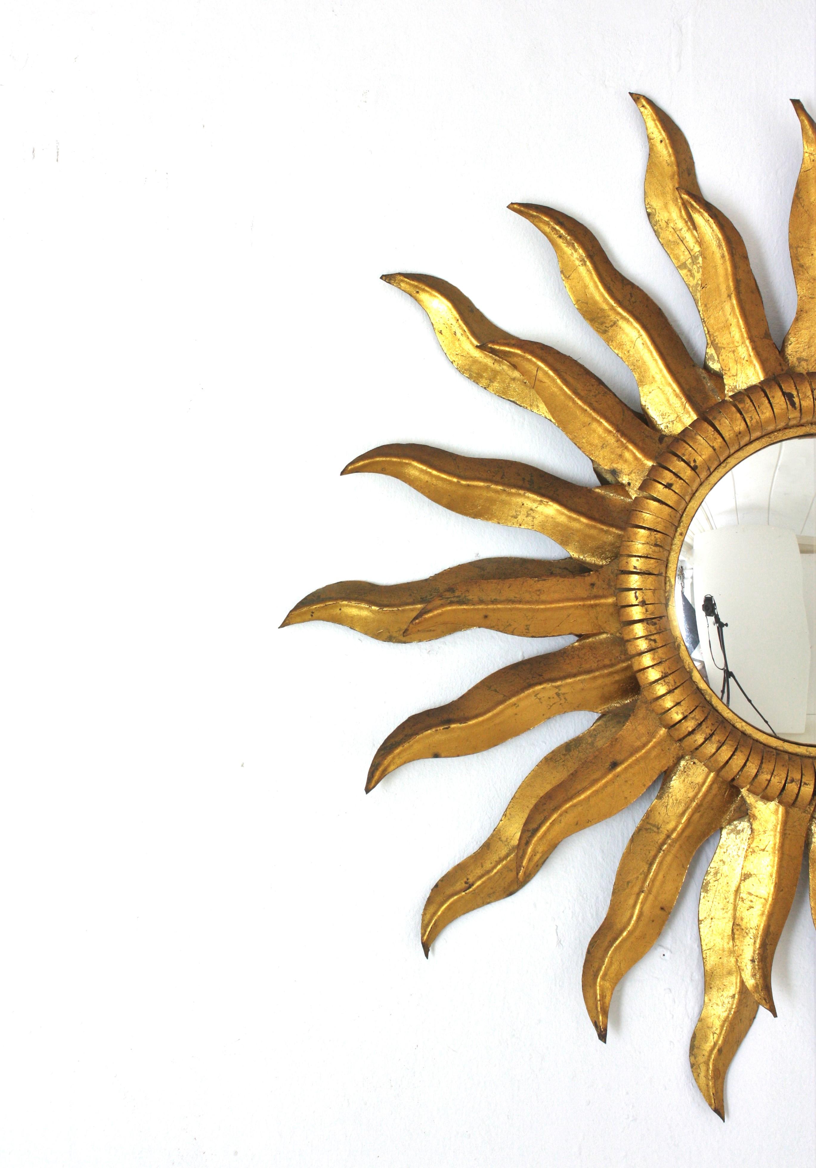 20th Century Pair of Spanish Double Layered Convex Sunburst Mirrors in Gilt Metal For Sale