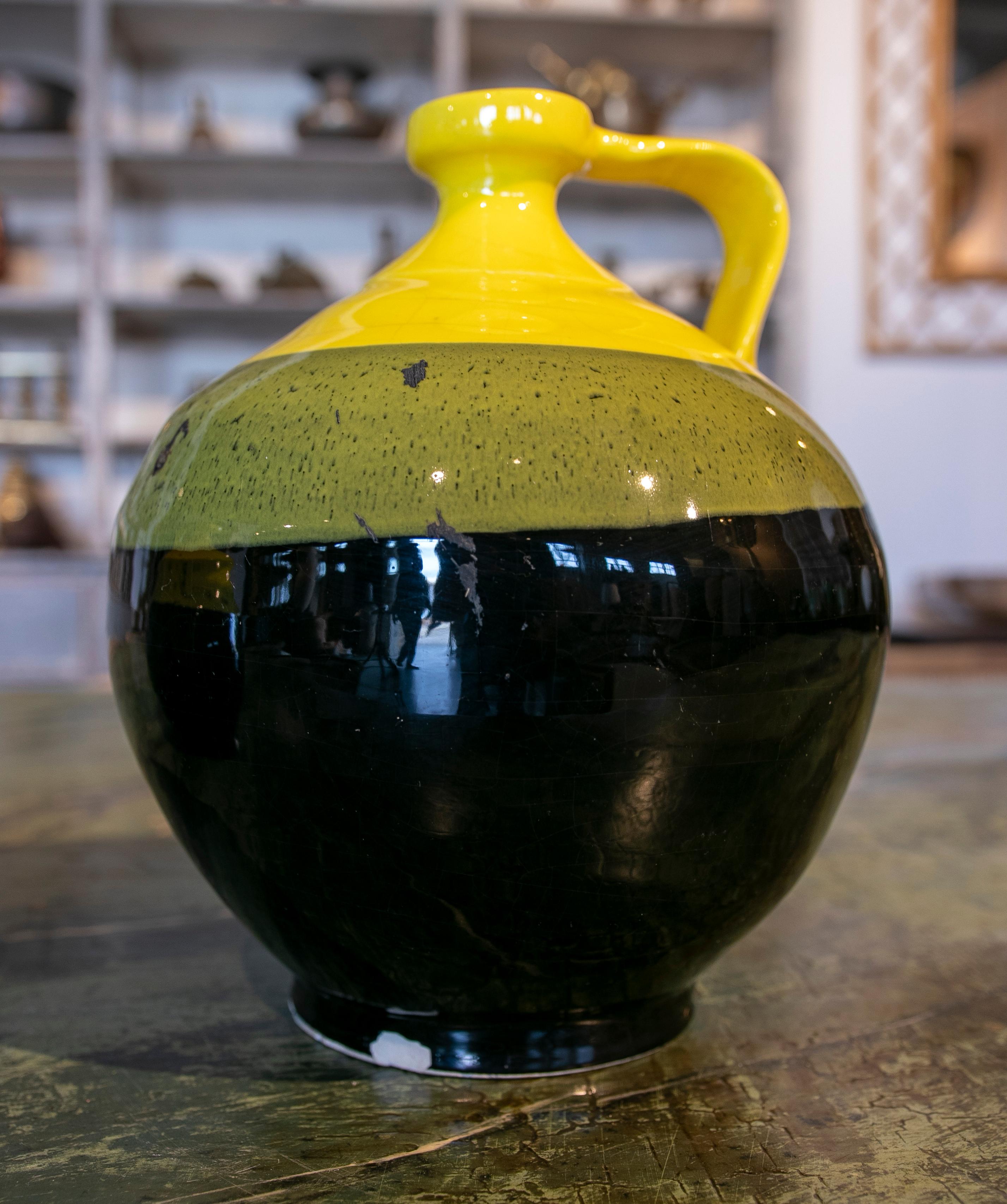 Pair of Spanish Glazed Ceramic Jug with Handle in Tones of Black and Yellow 9