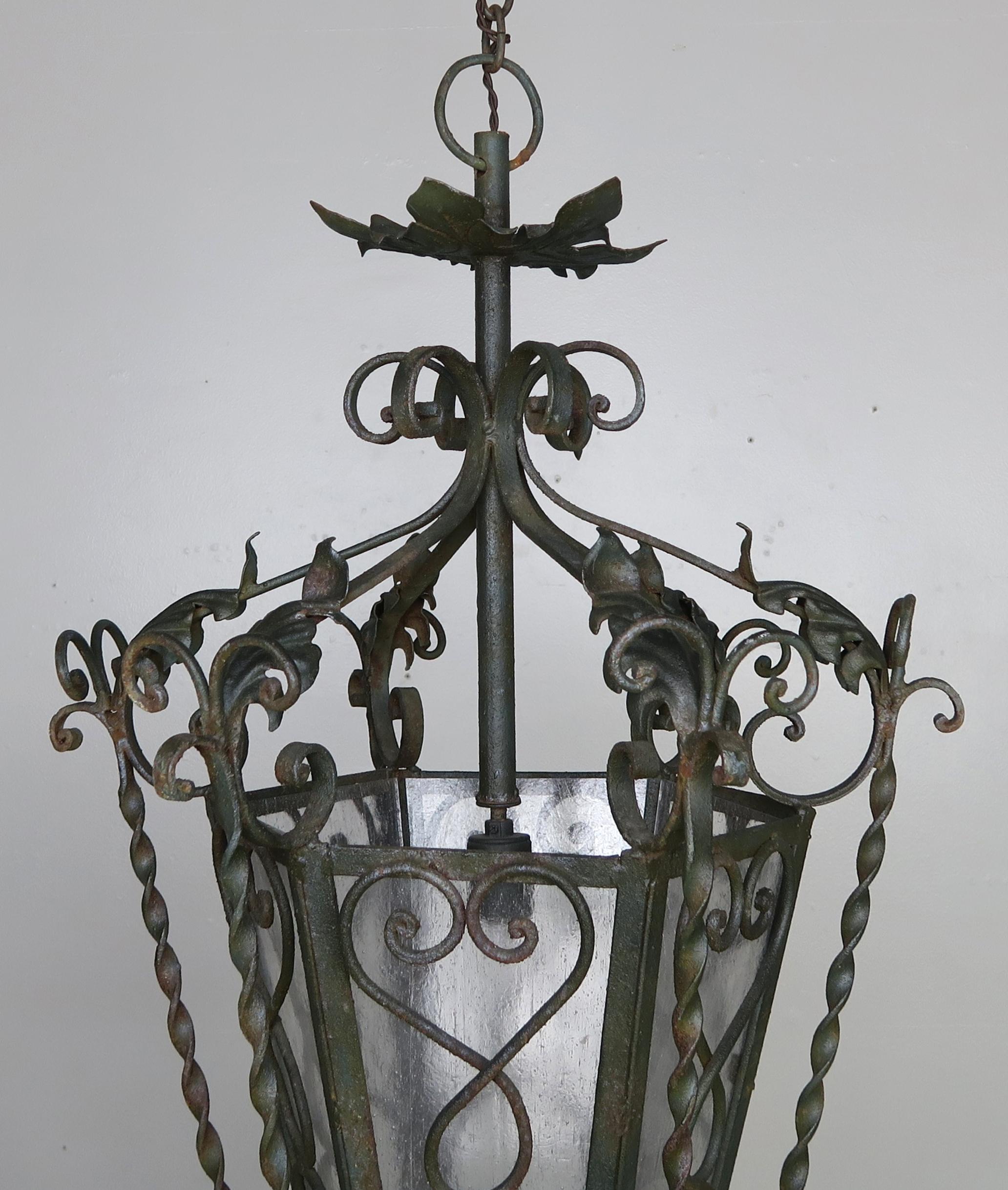 Glass Pair of Spanish Handwrought Iron Lanterns, circa 1940s