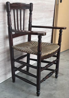 Coppia di poltrone spagnole con schienale a ferro di cavallo e canna da zucchero