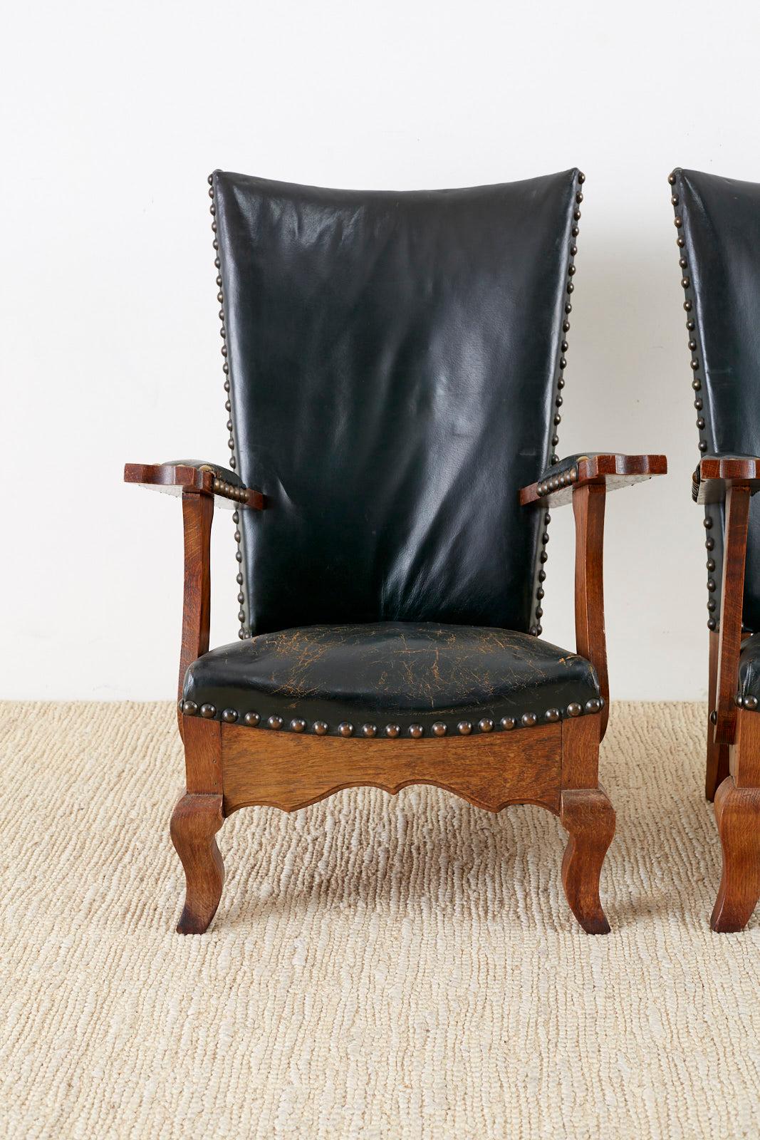 Spanish Colonial Pair of Spanish Oak and Leather Studded Lounge Chairs