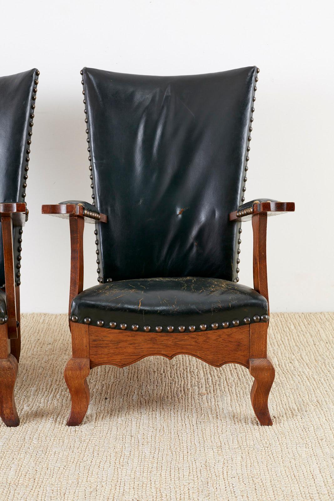 Hand-Crafted Pair of Spanish Oak and Leather Studded Lounge Chairs