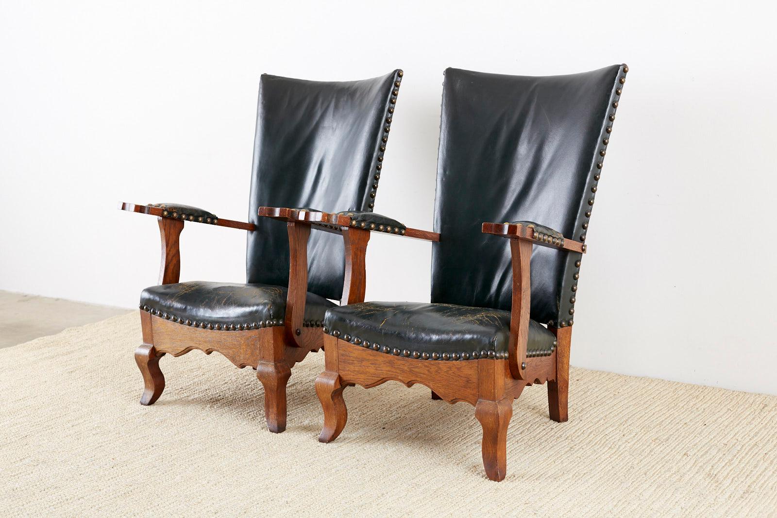 19th Century Pair of Spanish Oak and Leather Studded Lounge Chairs