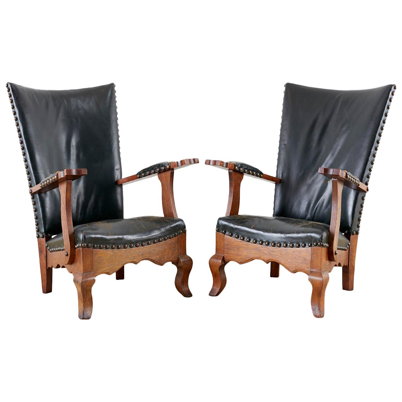 Pair of Spanish Oak and Leather Studded Lounge Chairs