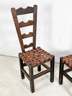 Pair of Spanish Primitive Fireside Chairs With Leather Strapping, Circa 1930s