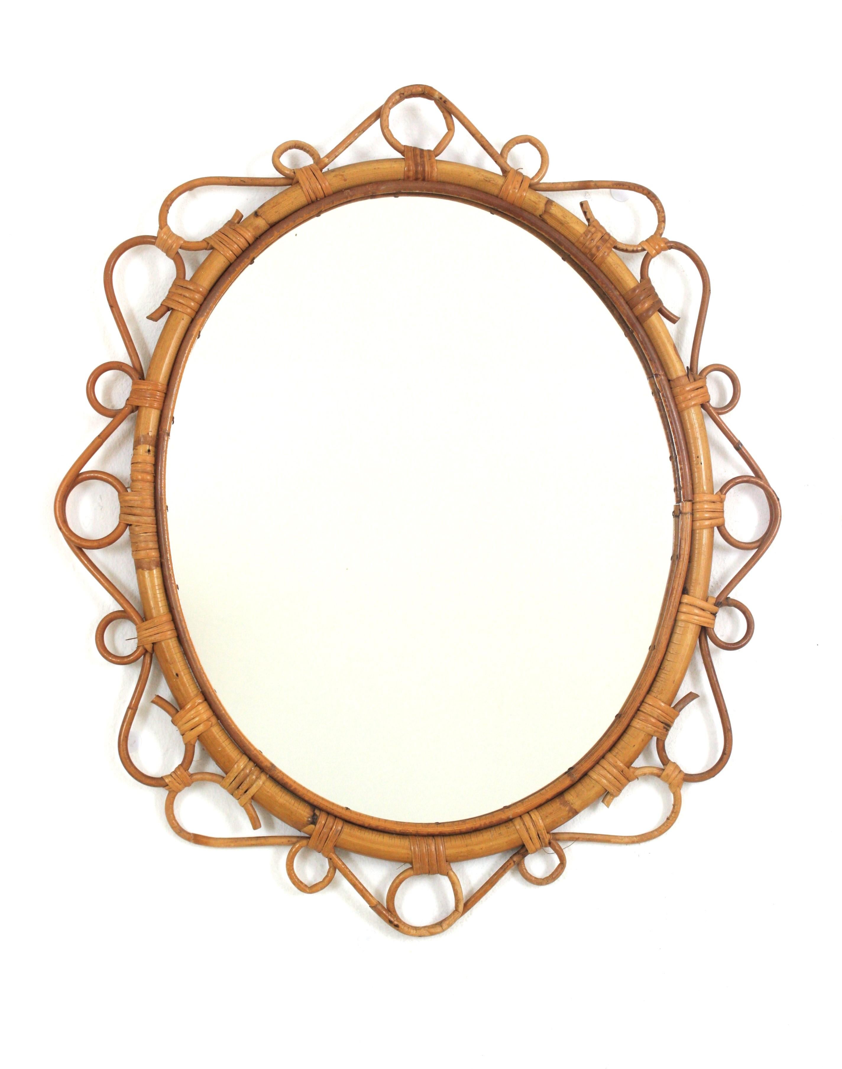 Espagnol Paire de miroirs ovales espagnols en rotin et bambou, années 1960 en vente