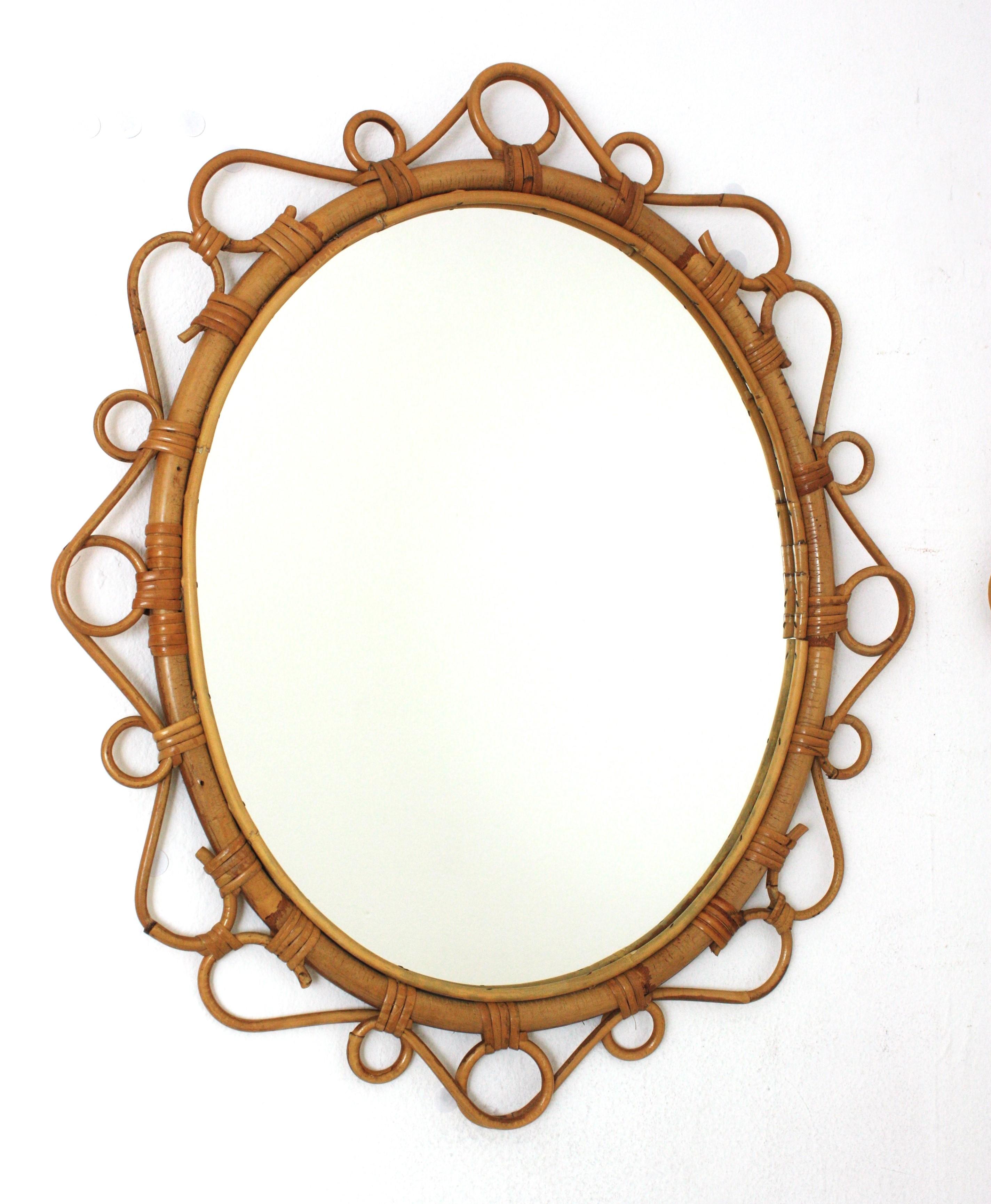 Fatto a mano Coppia di specchi ovali in rattan spagnolo e bambù, anni '60