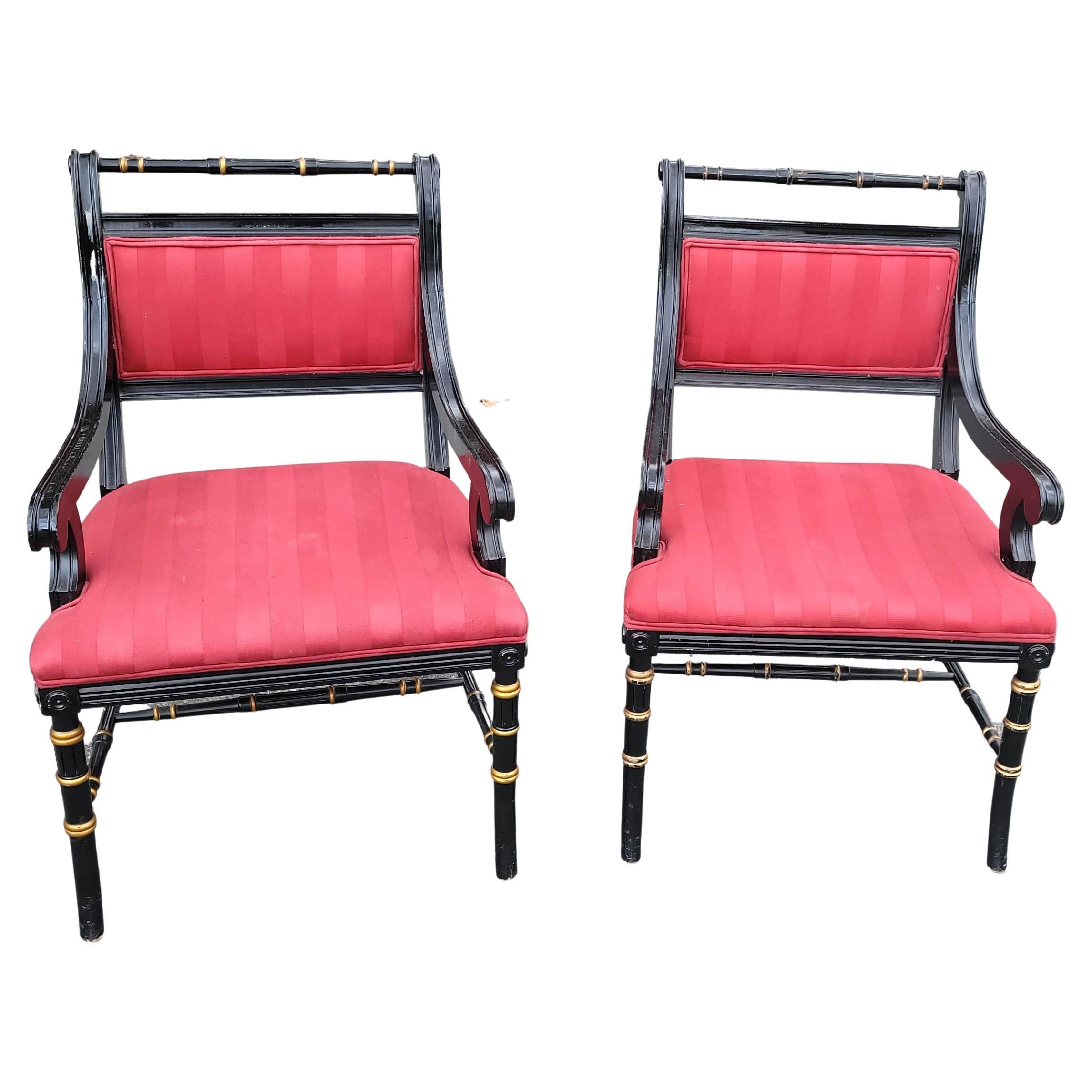 Painted Pair of Spanish Regency Parcel Gilt and Ebonized Upholstered Armchairs For Sale
