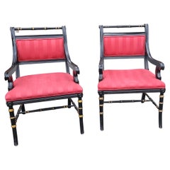 Pair of Spanish Regency Parcel Gilt and Ebonized Upholstered Armchairs