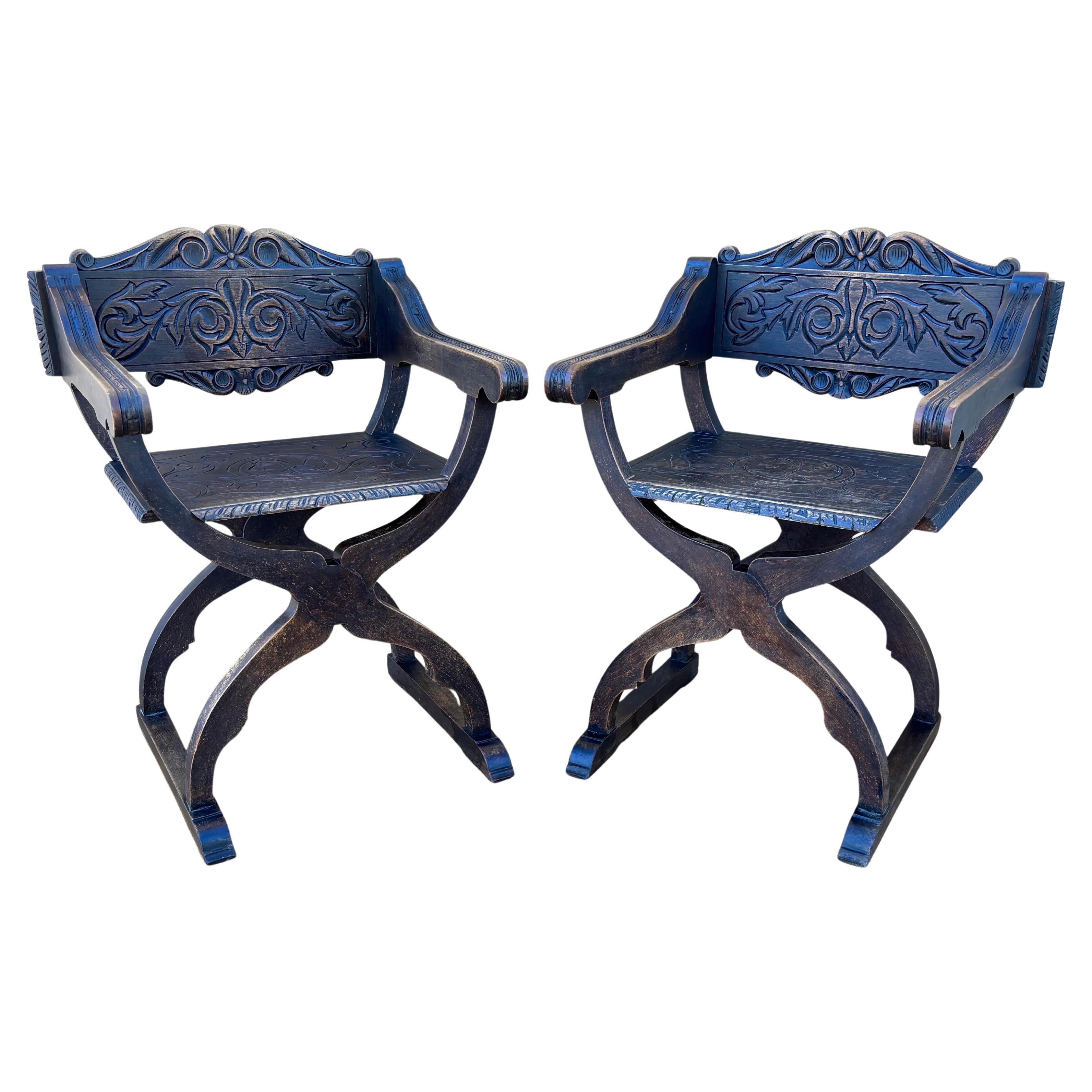 Pair of Spanish Renaissance Revival Carved Savonarola Chairs, Early 20th Century