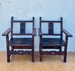 Pair of Spanish Renaissance Style Carved Wooden Armchairs