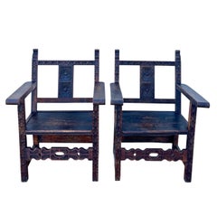 Pair of Spanish Renaissance Style Carved Wooden Armchairs