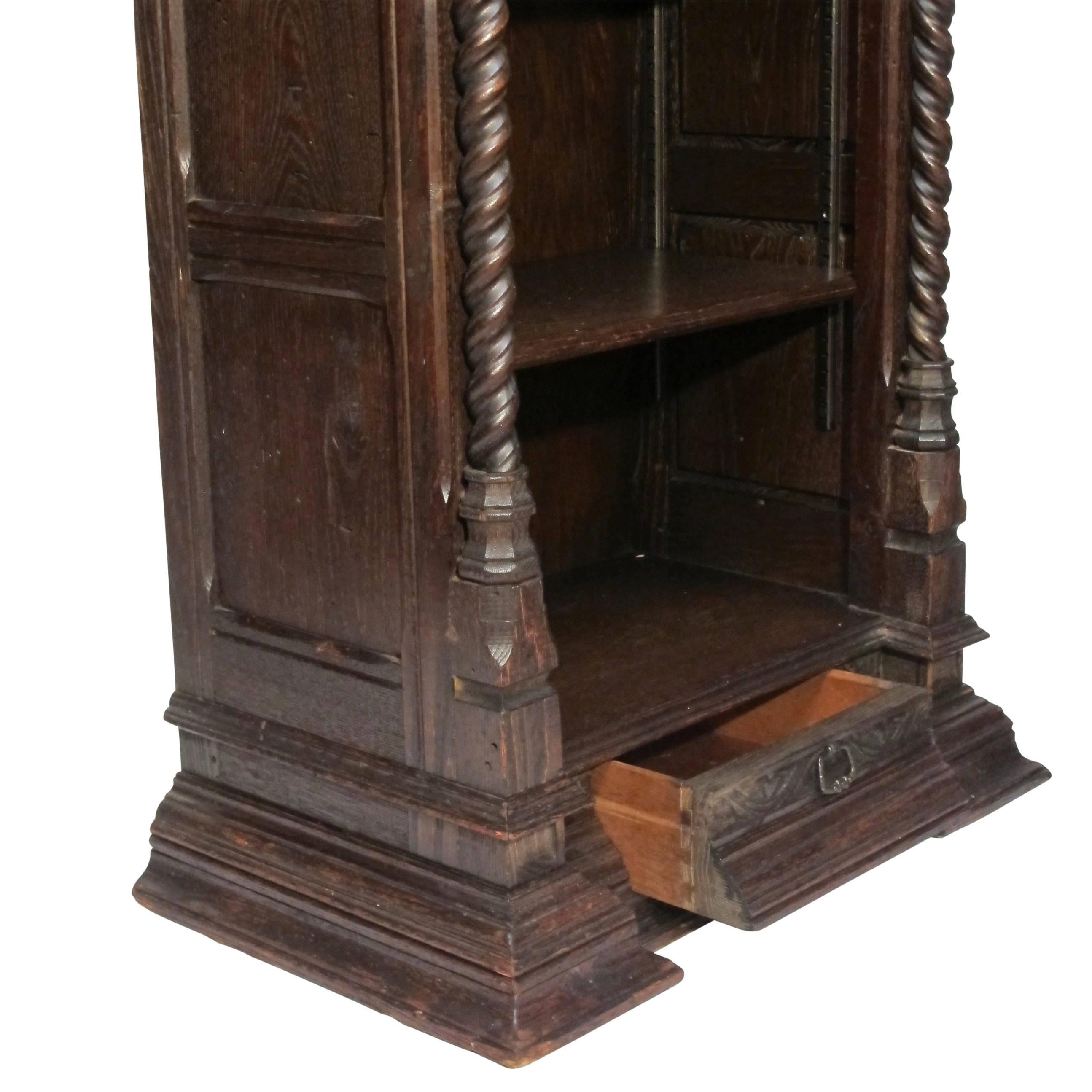 Carved Pair of Spanish Revival Oak Bookcases, American, circa 1920