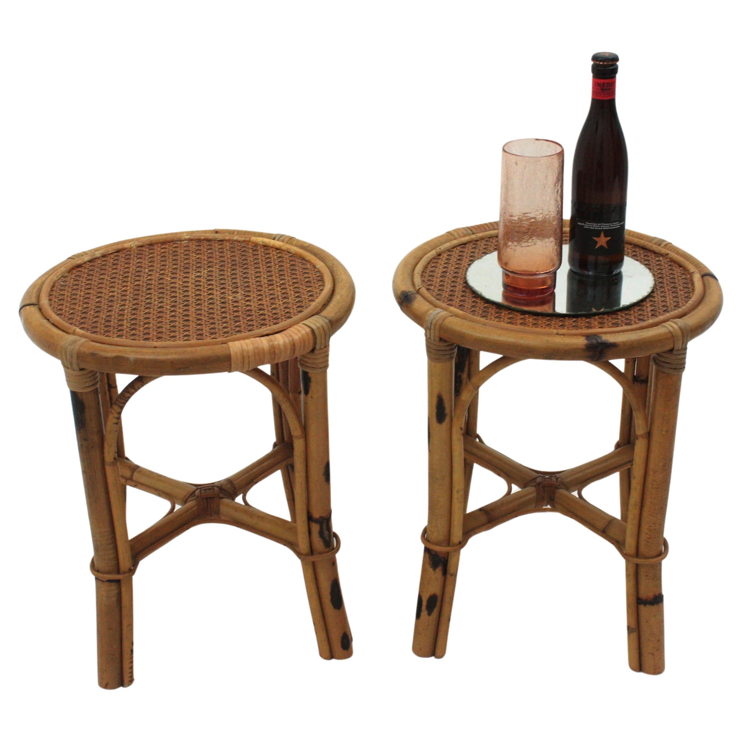 Pair of Spanish Modernist handcrafted stools with wicker wire top, rattan, bamboo. Spain, 1960s-1970s.
This cool rattan round stools feature a bamboo structure with a canage top.
This pair of seats will add a Midcentury Coastal or fresh accent to