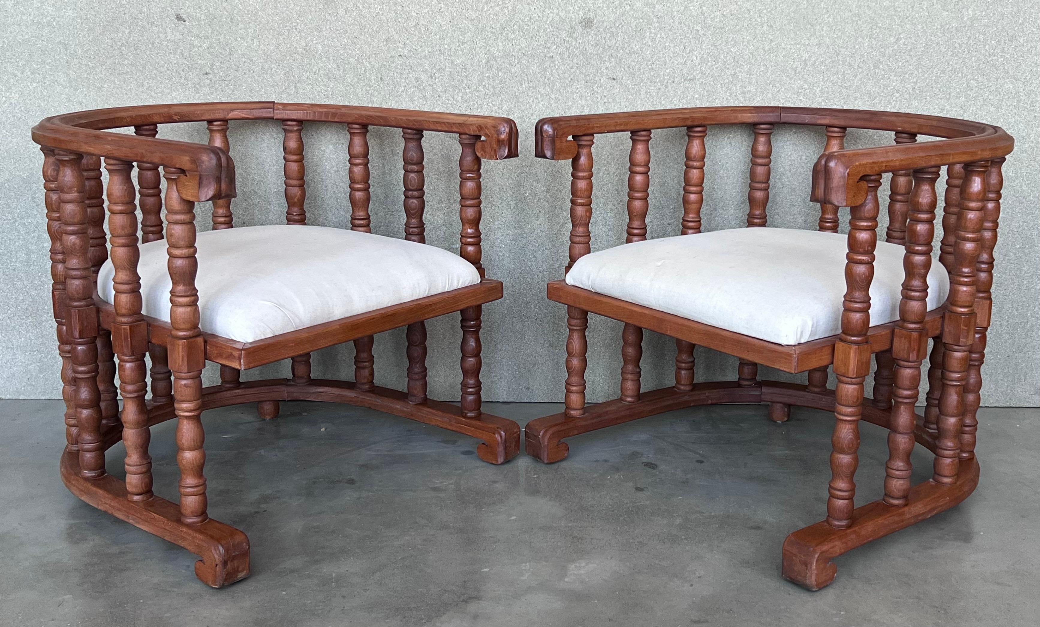 Baroque Revival Pair of Spanish Slatted Barrel Back Hand Carved Chairs For Sale