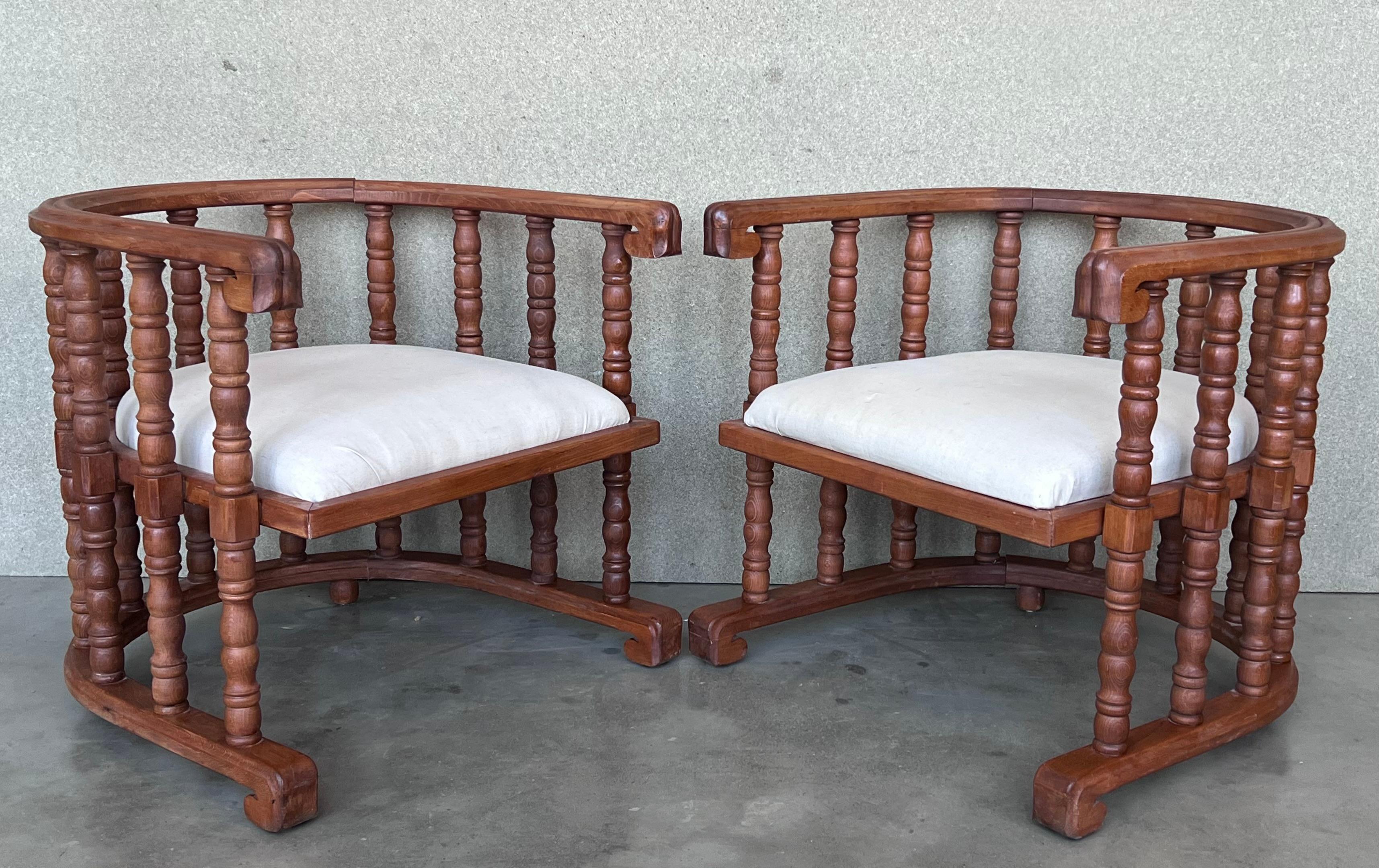 20th Century Pair of Spanish Slatted Barrel Back Hand Carved Chairs For Sale