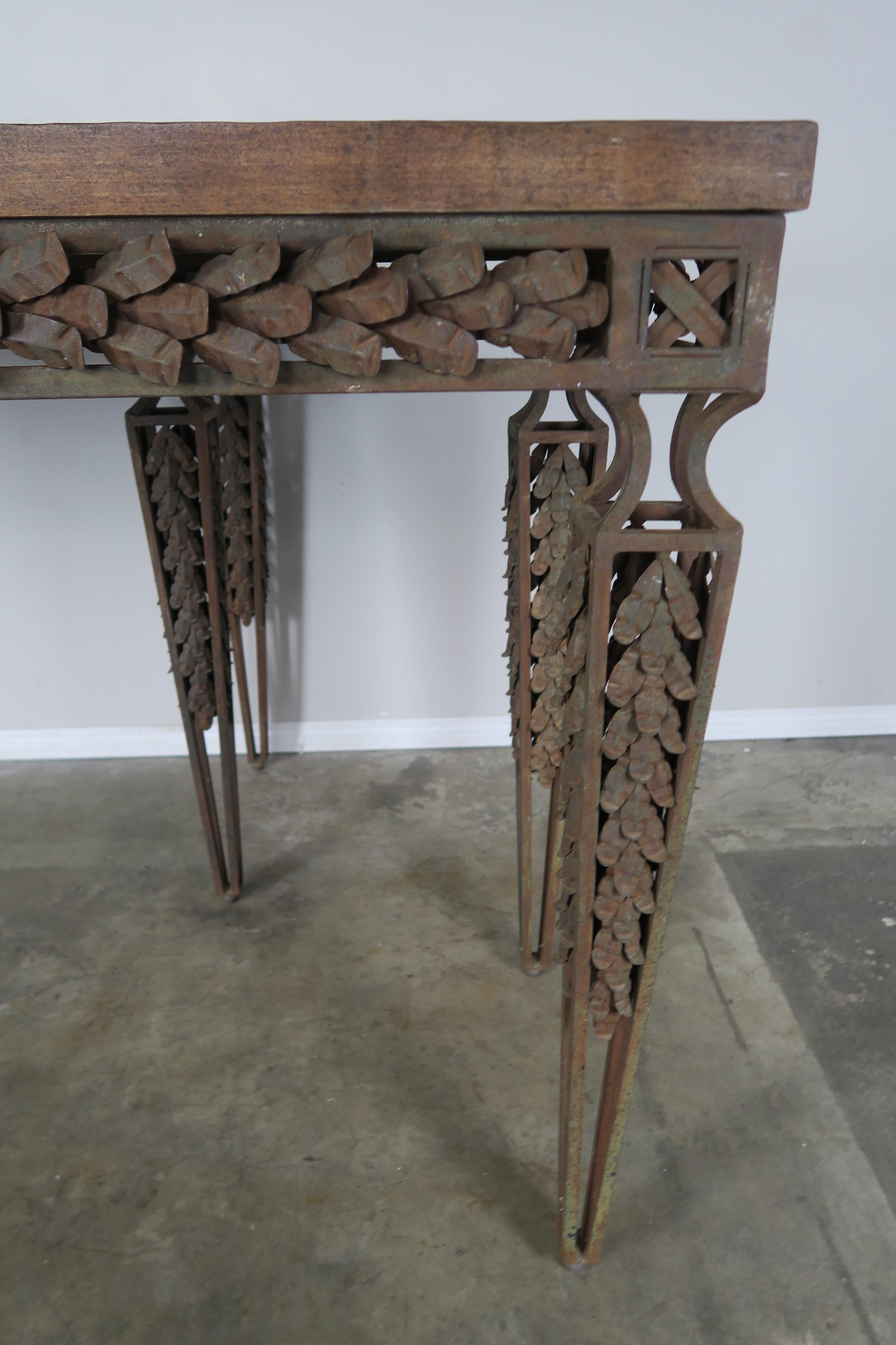 Pair of Spanish Style Wrought Iron Consoles with Wood Tops In Distressed Condition In Los Angeles, CA