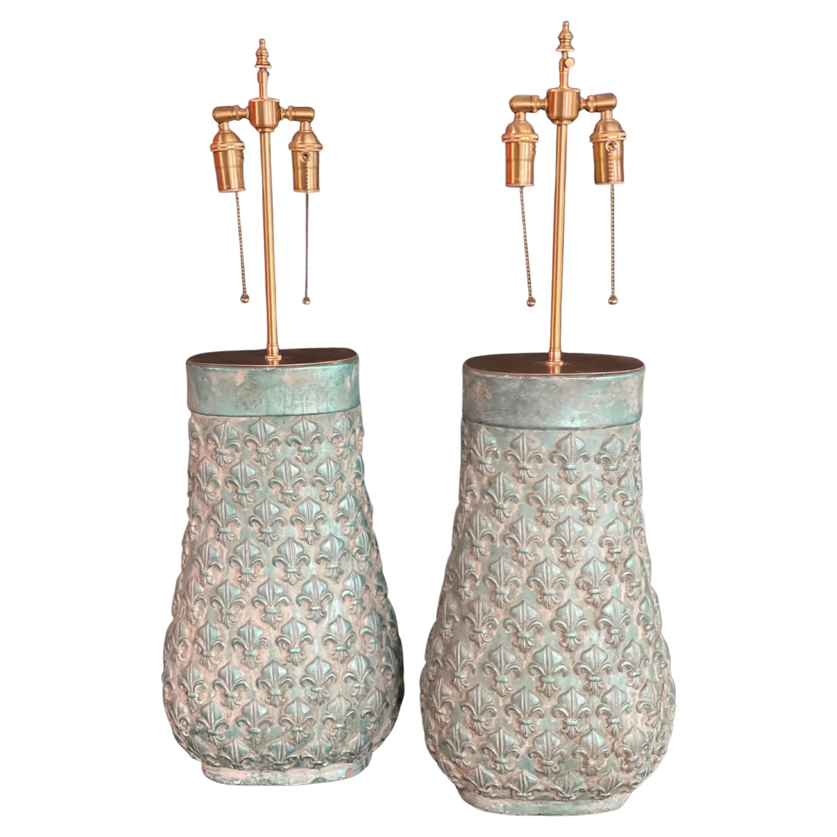 This Pair of Monumental  French Patinaed Fleur De Lis Gourdes With Lamp application have so much appeal as they add a tremendous character to any space with the beautiful patina, shape,  and design pattern details. 